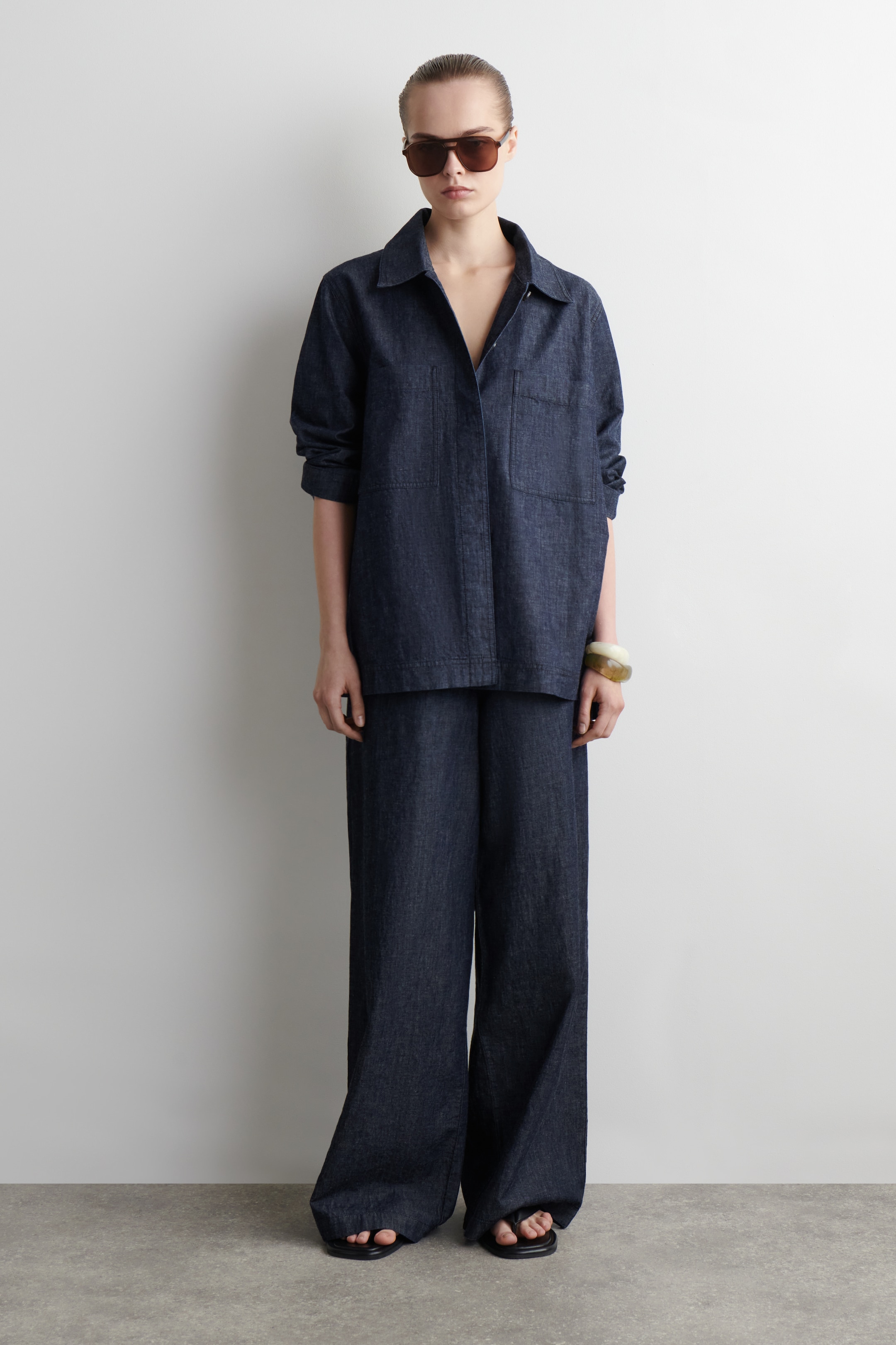Grotere afbeelding bekijken: DENIM BROEK MET WIDE-LEG EN TREKKOORD - INDIGO - DAMES | H&M BE 2
