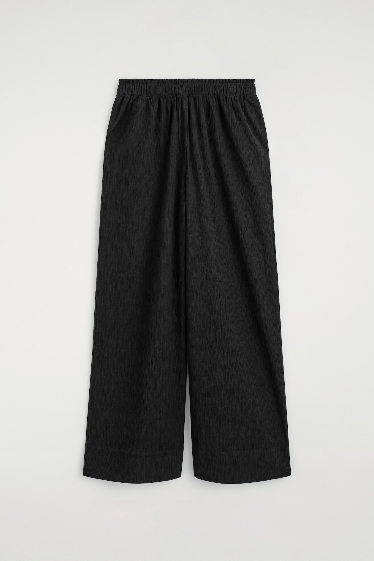 CRINKLED-JERSEY WIDE-LEG TROUSERS — BLACK
