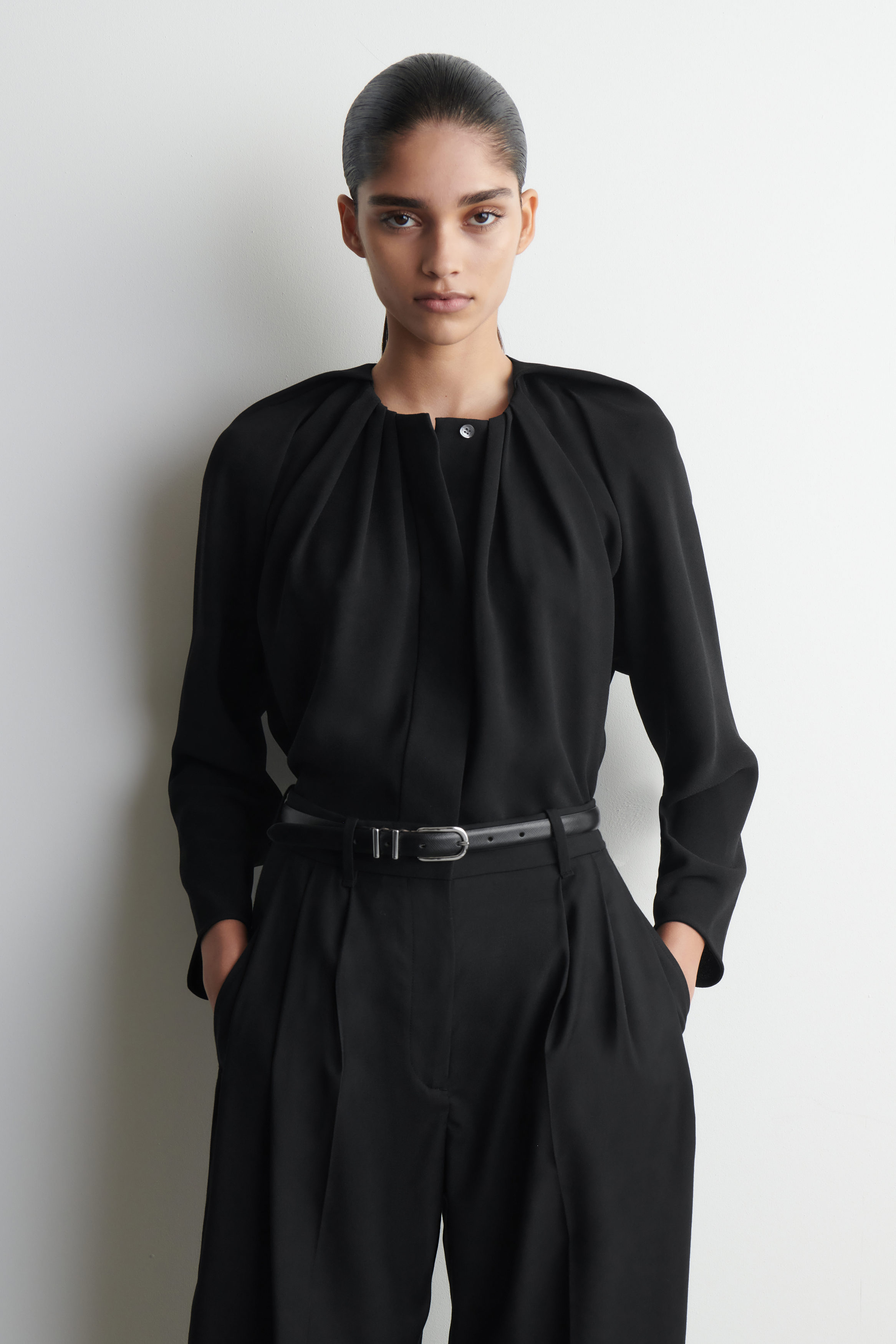 VOLUMINOUS PLEATED BLOUSE - BLACK | COS US