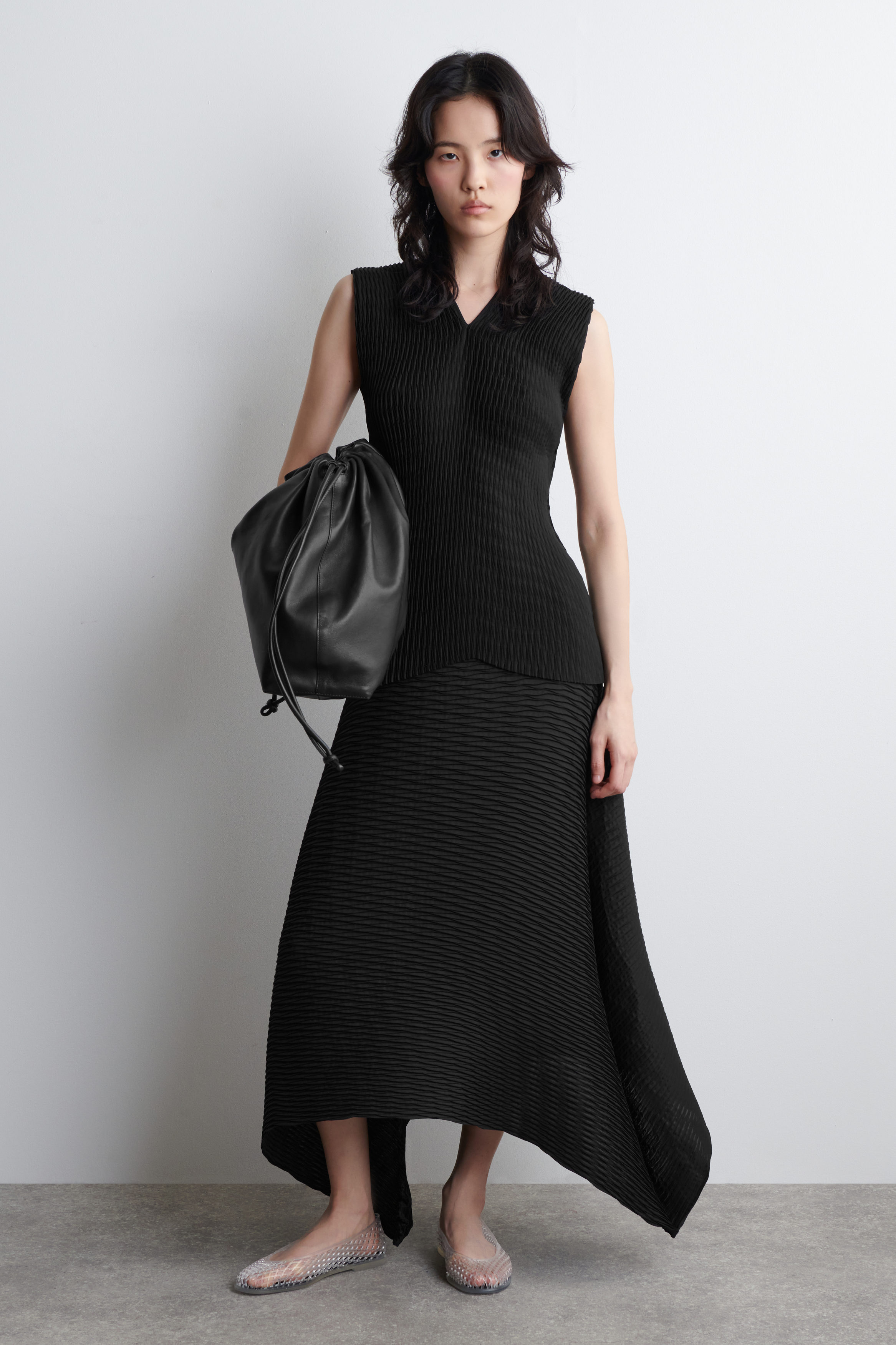 VOLUMINOUS PLEATED MIDI SKIRT