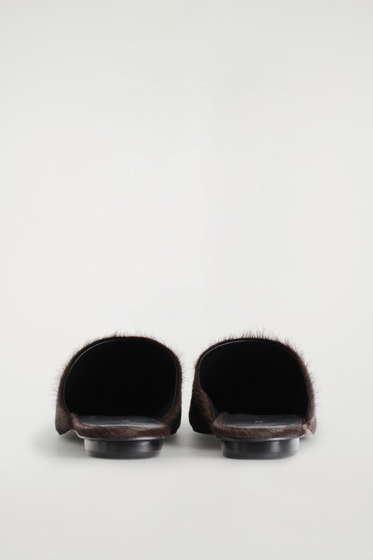 PONY HAIR-EFFECT LEATHER MULES — DARK BROWN