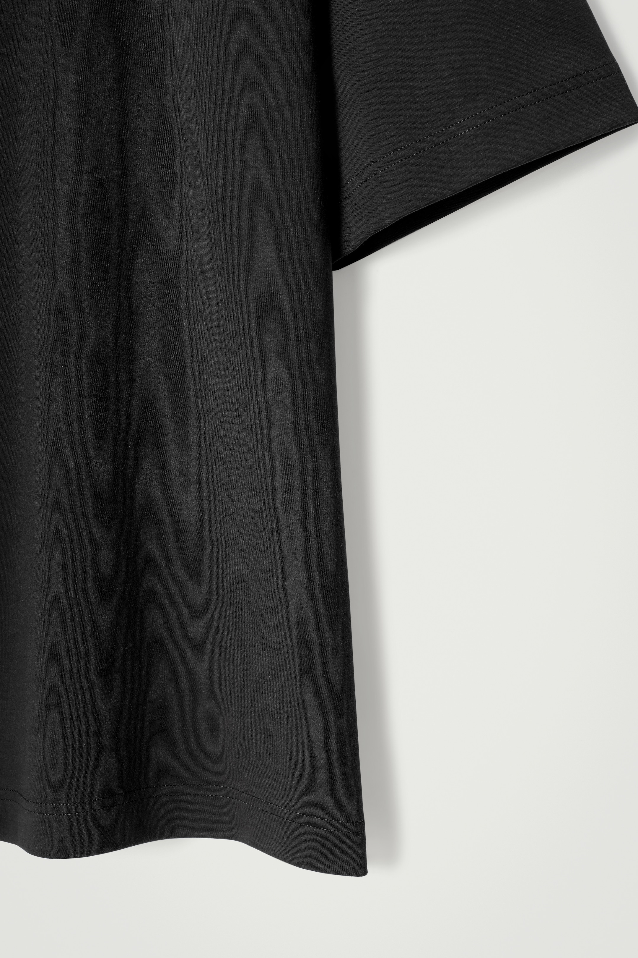 Größeres Bild anzeigen: T-SHIRT AUS BAUMWOLLE MIT RUNDHALSAUSSCHNITT - SCHWARZ - Men | H&M AT 6