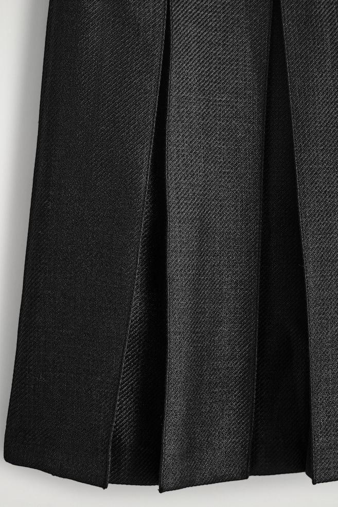 PLEATED WOOL-BLEND SKIRT — BLACK