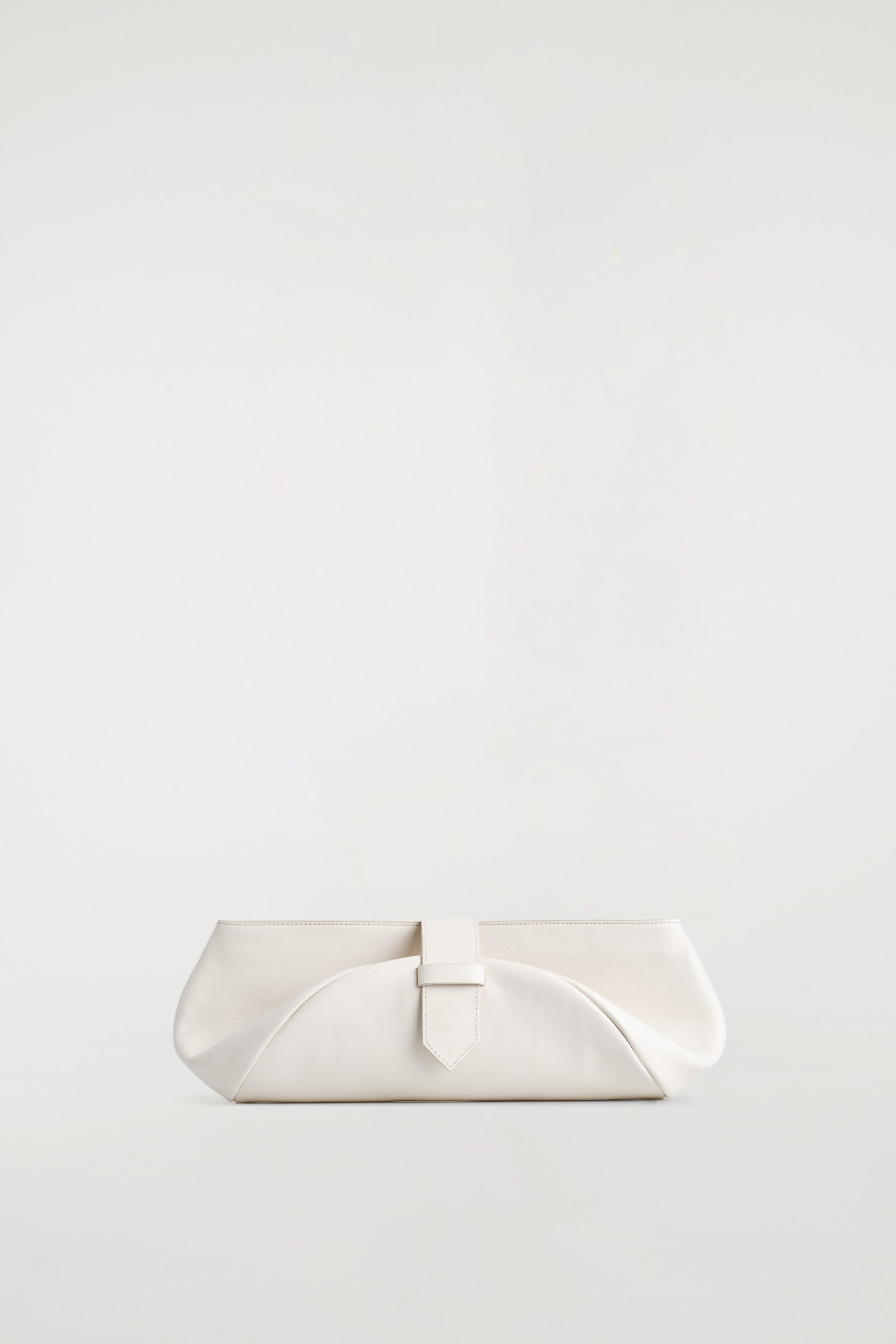 BELTED CLUTCH BAG - LEATHER