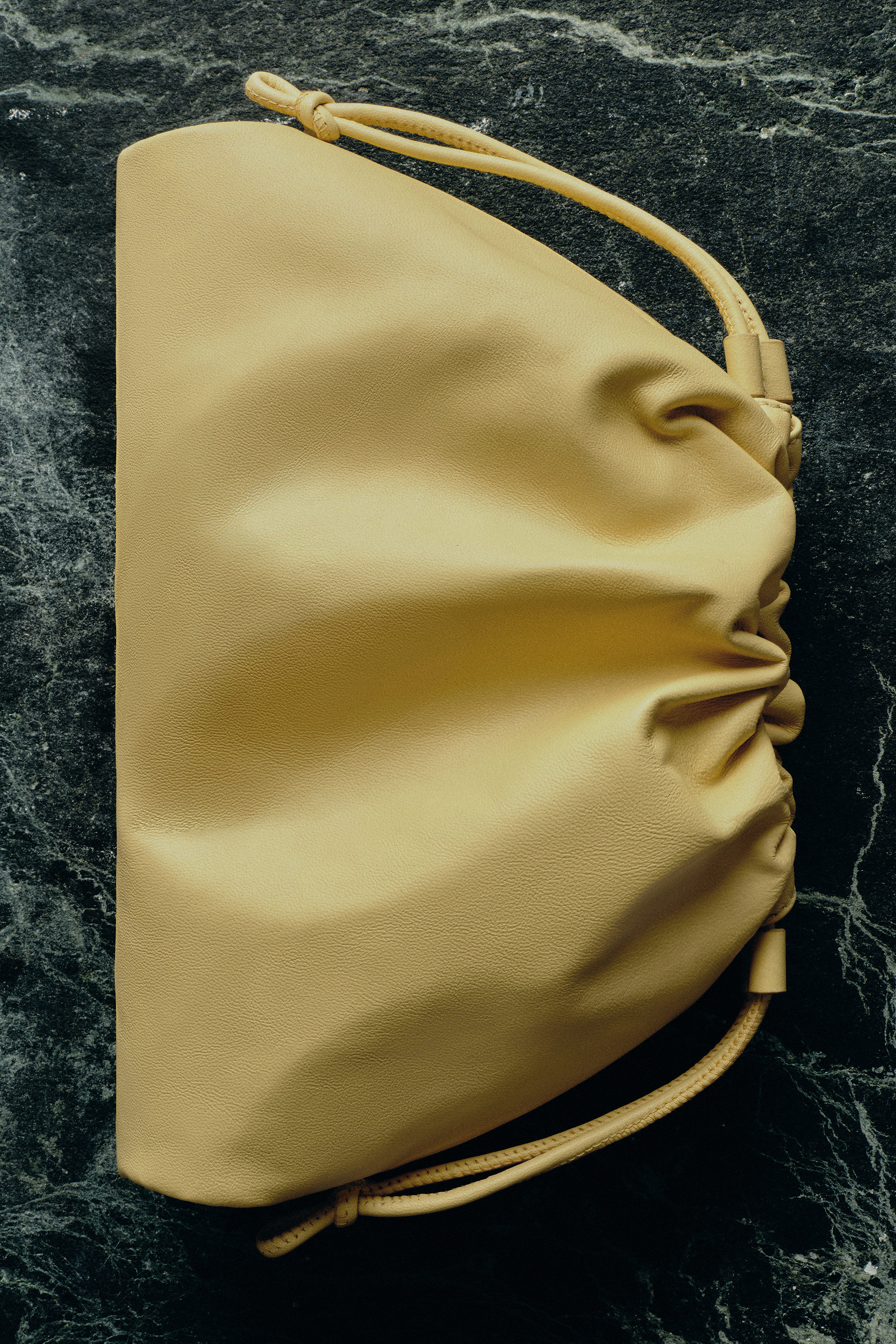 MINI CAVATELLI CLUTCH BAG - LEATHER - BUTTER YELLOW | COS