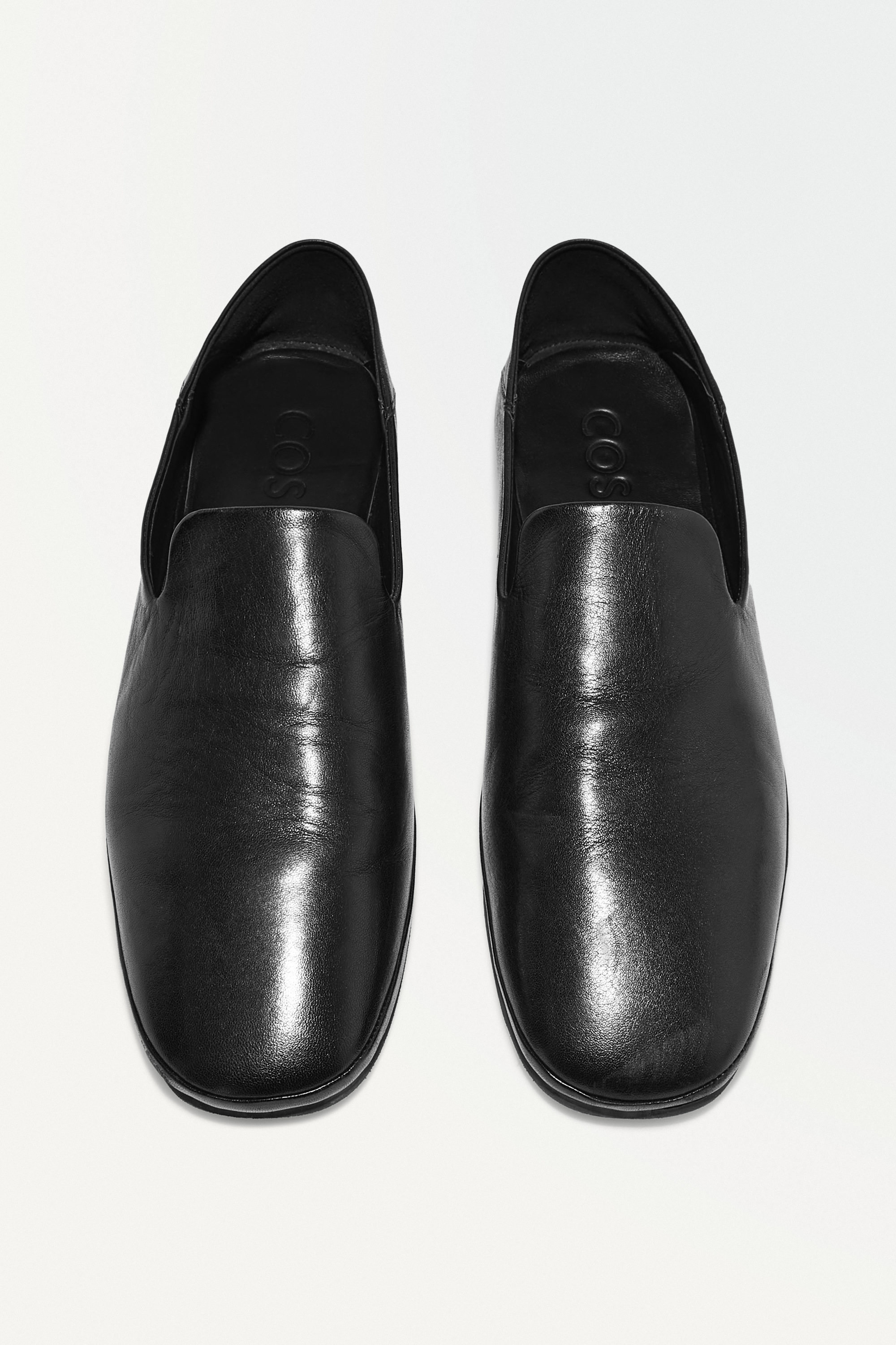 black leather slip on shoes
