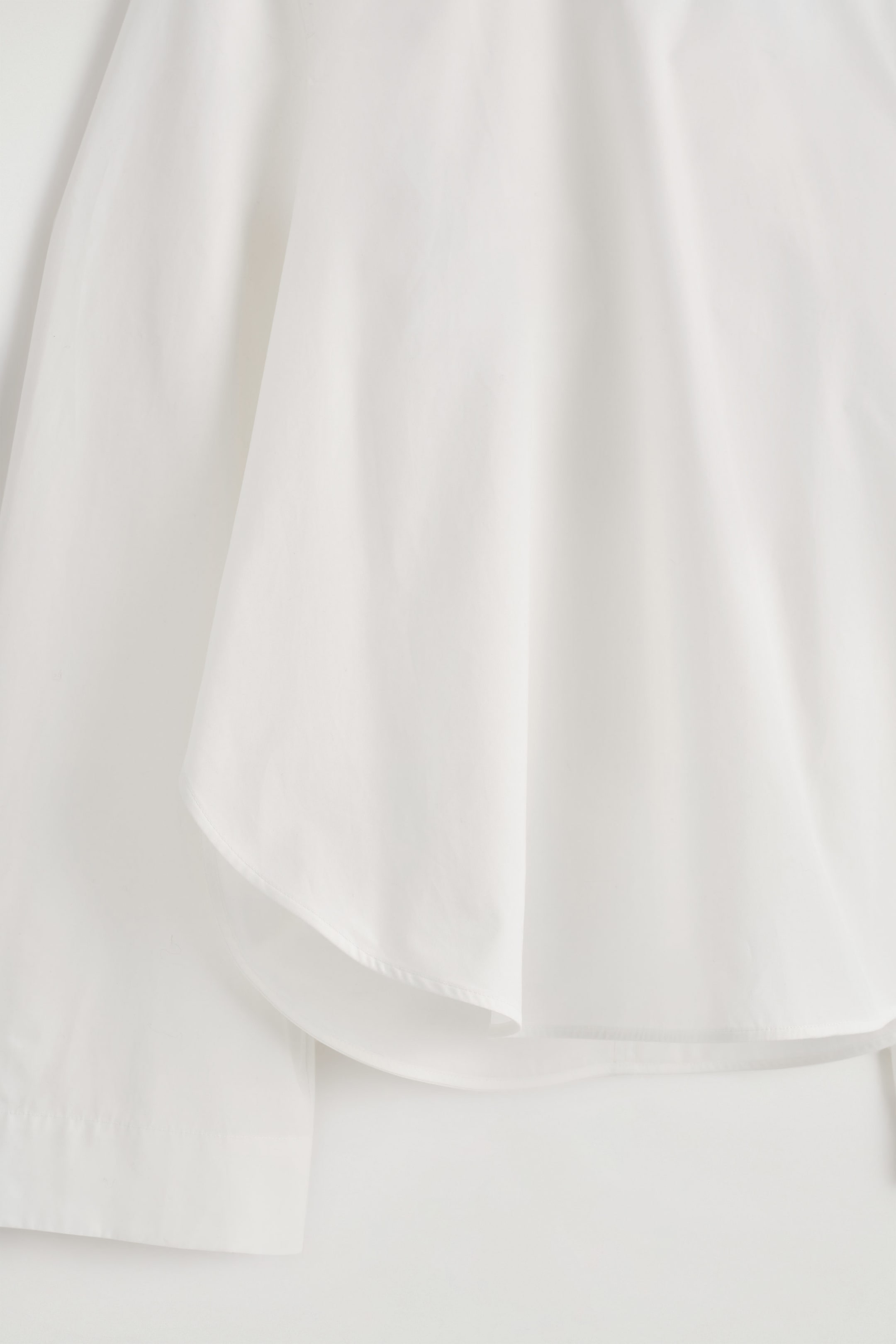 CURVED-HEM COTTON BLOUSE