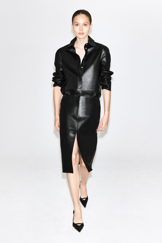 LEATHER MIDI SKIRT — BLACK
