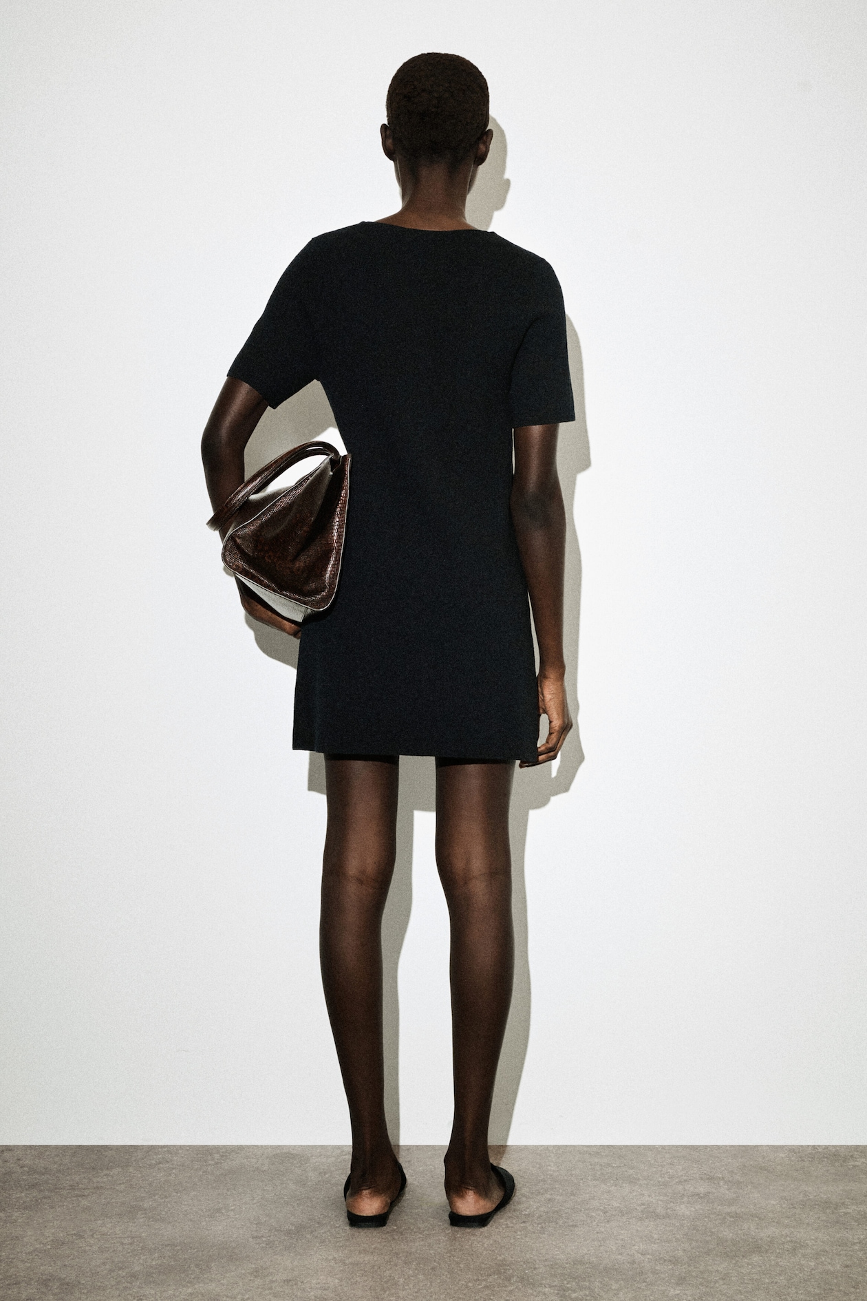 BUTTONED MILANO-KNIT MINI DRESS — BLACK