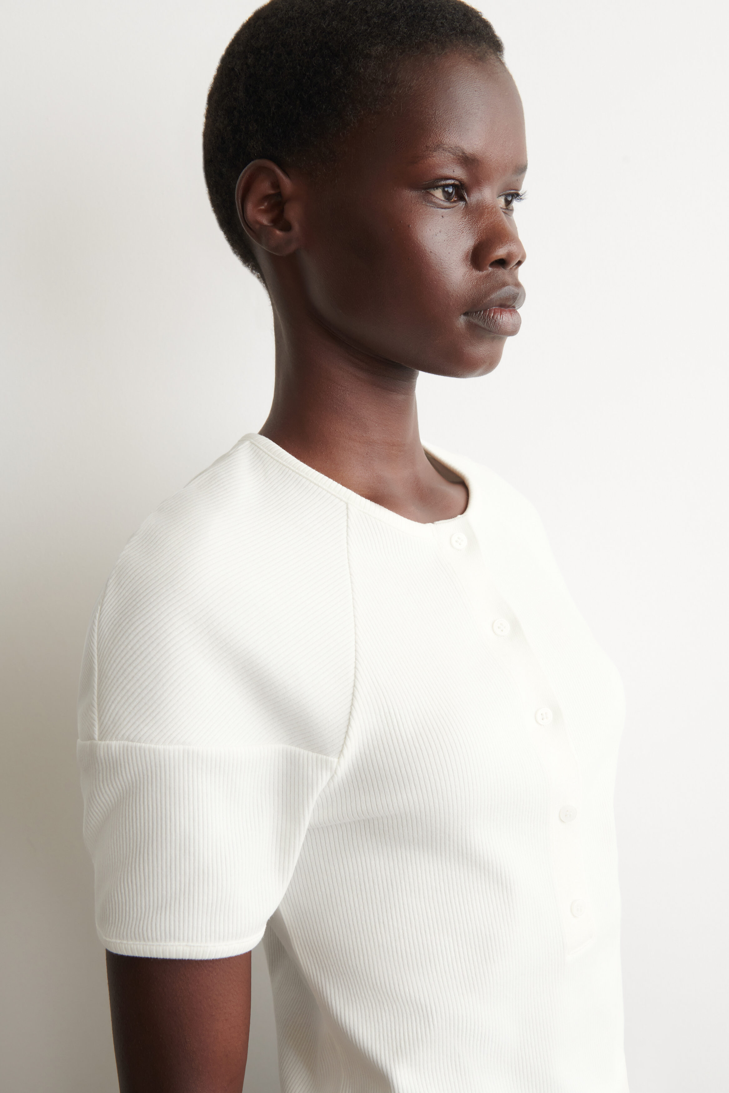 ROUNDED RIBBED JERSEY HENLEY TOP - WHITE | COS US