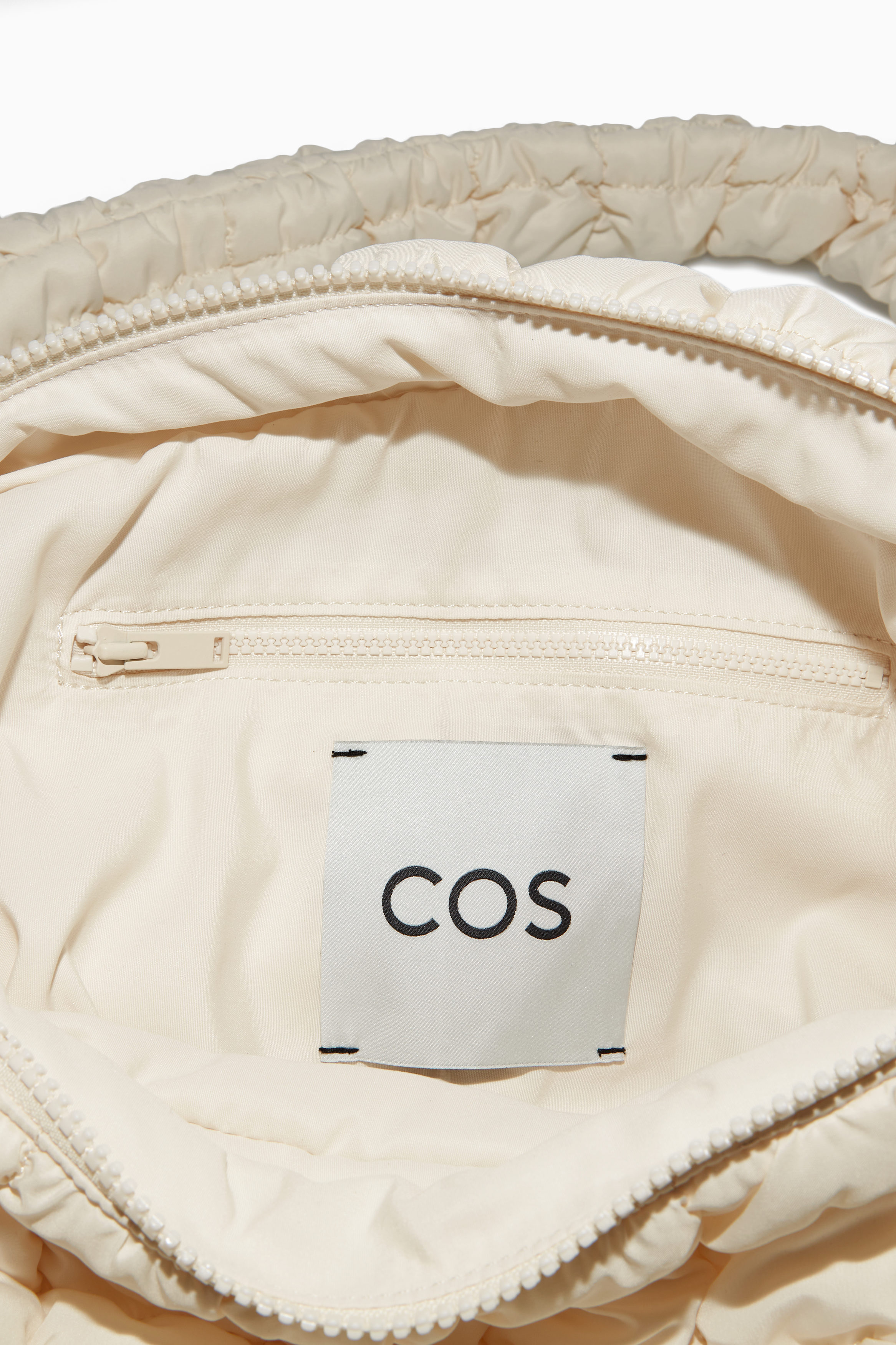 OVERSIZED QUILTED CROSSBODY BAG - BEIGE | COS