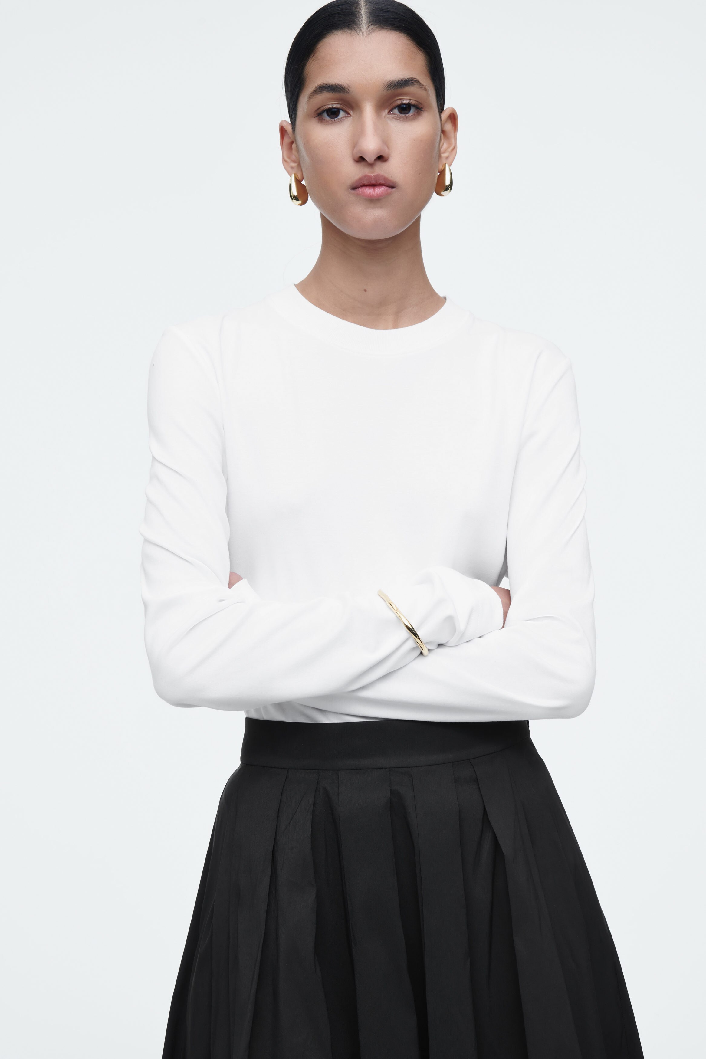 PLEATED A-LINE MIDI SKIRT - BLACK | COS