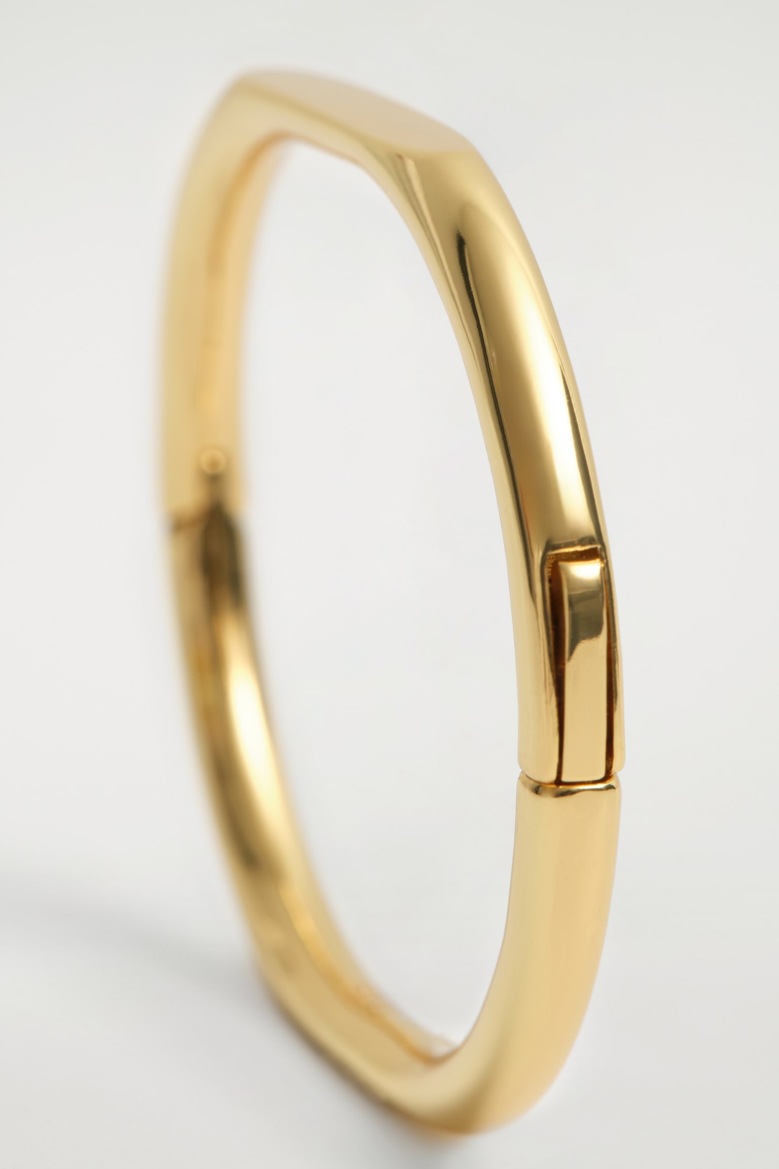 BRACCIALE RIGIDO DALLE LINEE SCOLPITE - ORO/ARGENTO - 3