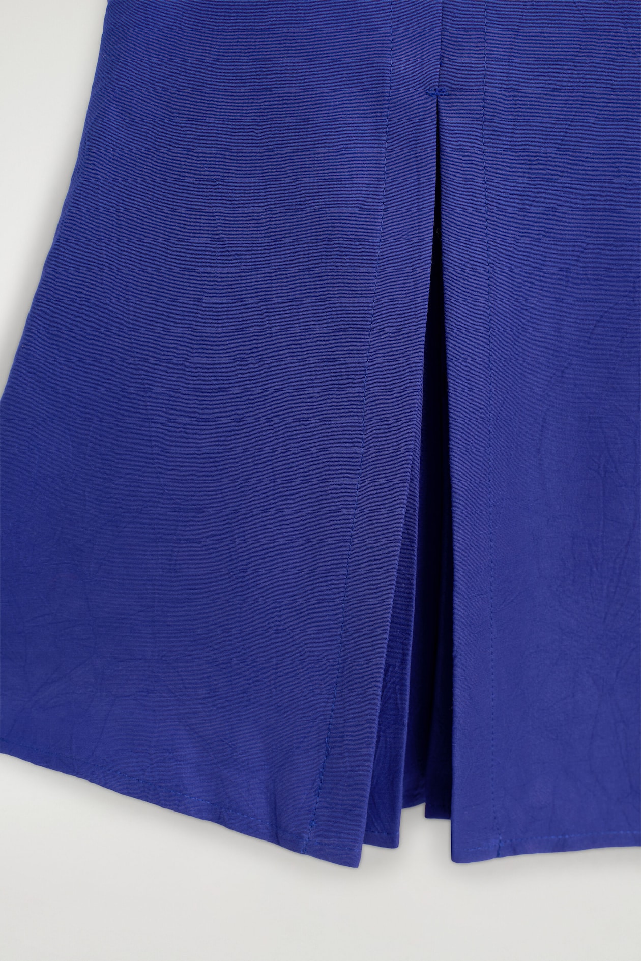 PLEATED PEPLUM TOP — COBALT BLUE