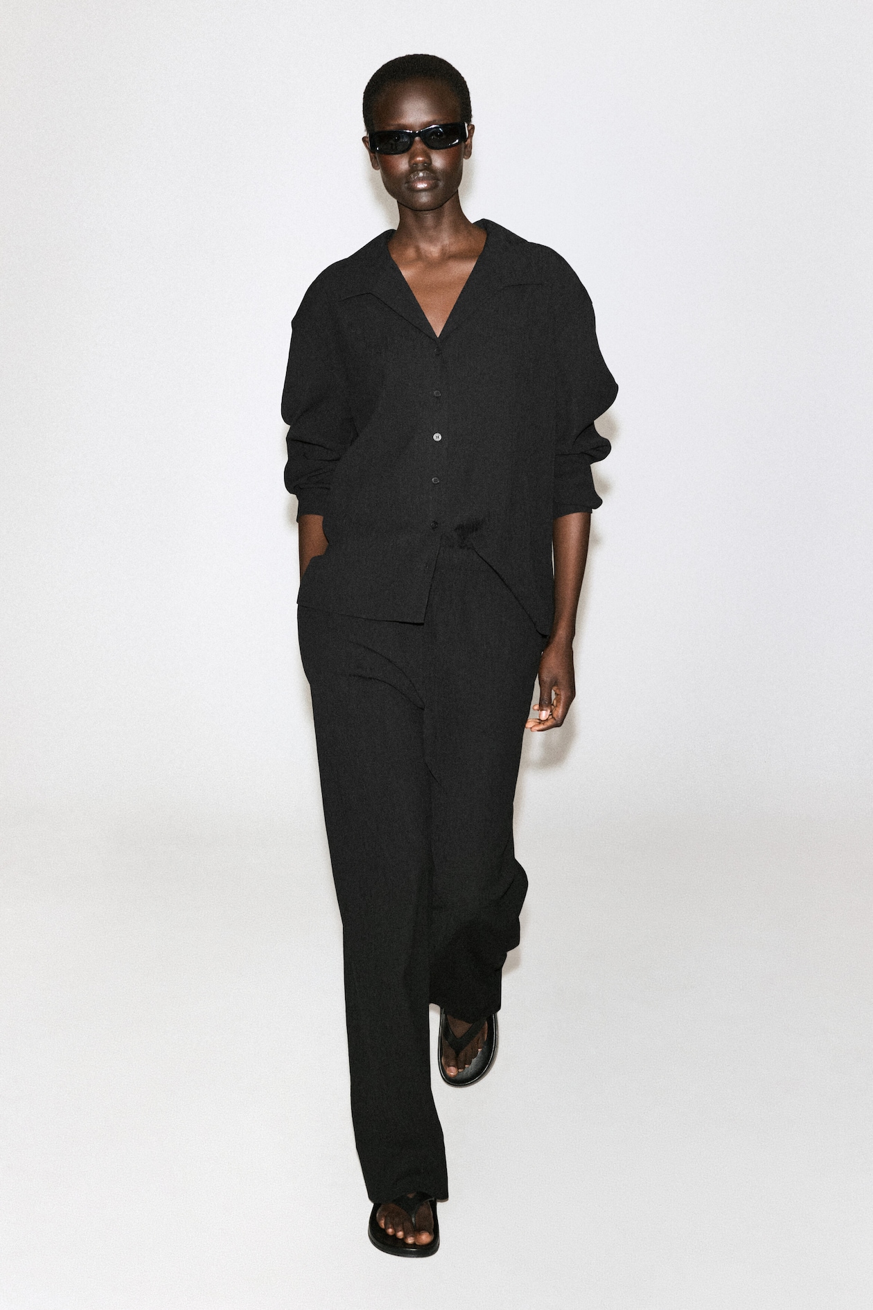 CRINKLED-JERSEY WIDE-LEG TROUSERS — BLACK