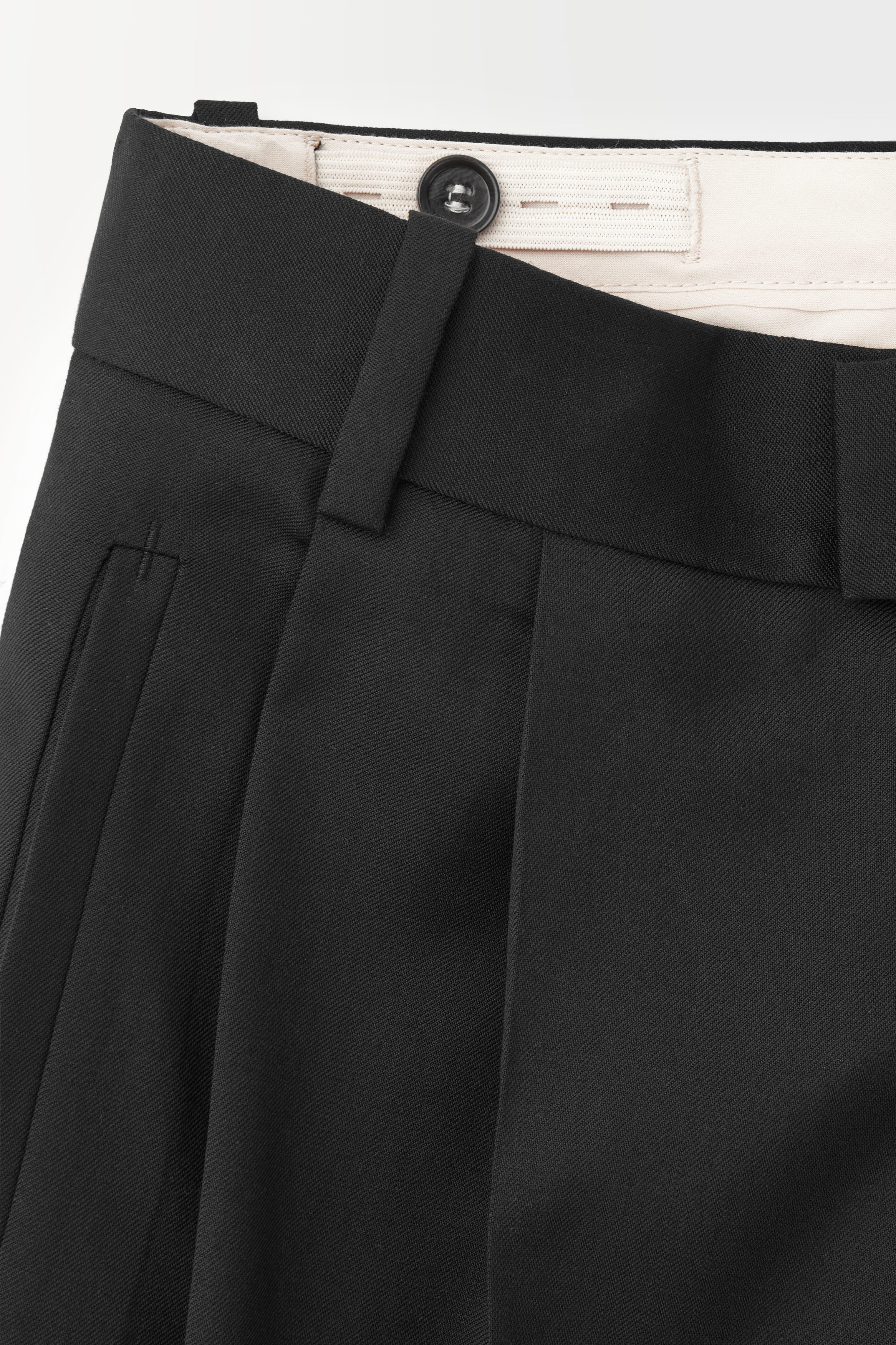 THE PLEATED WOOL TROUSERS - BLACK | COS