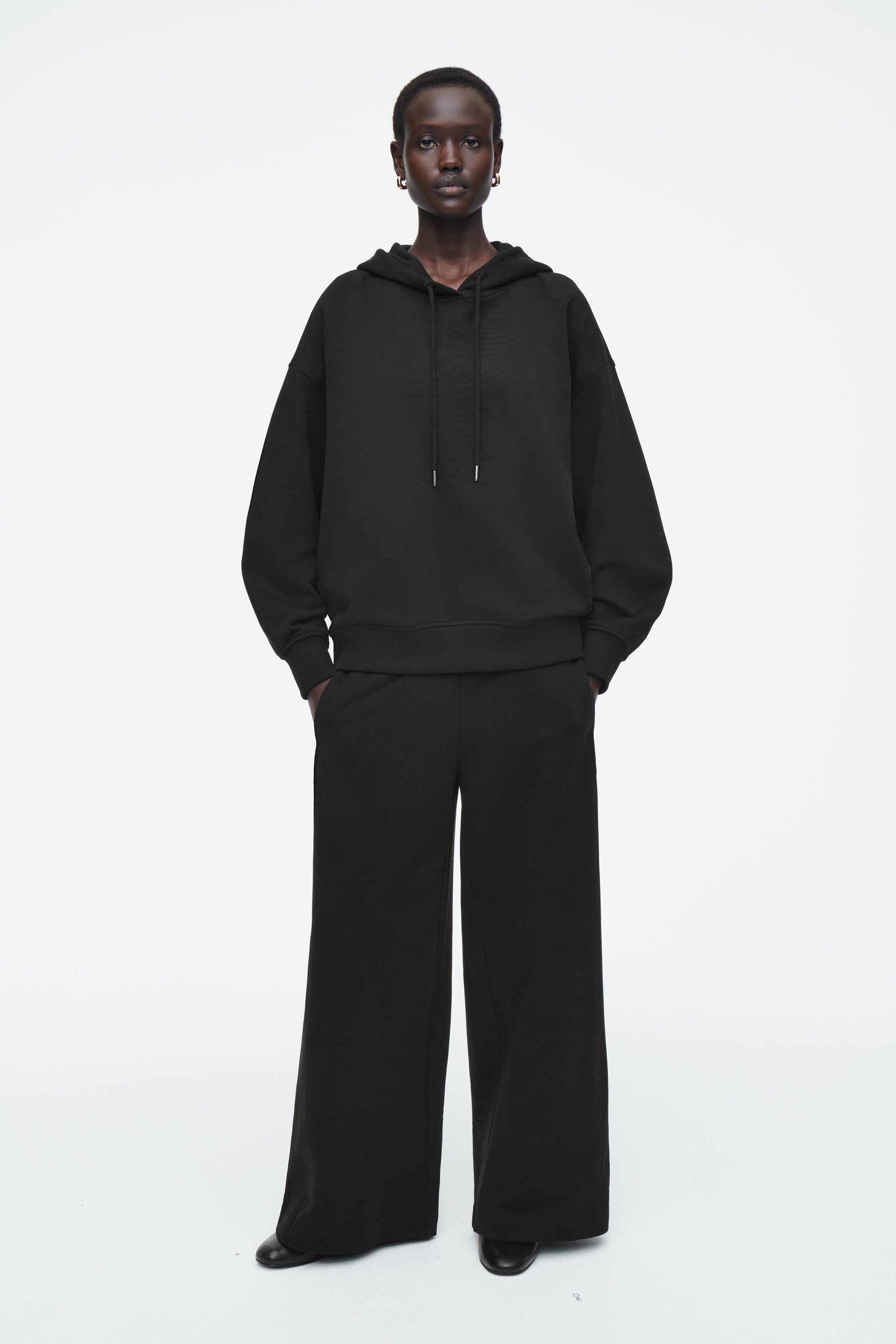 OVERSIZED JERSEY HOODIE - BLACK | COS