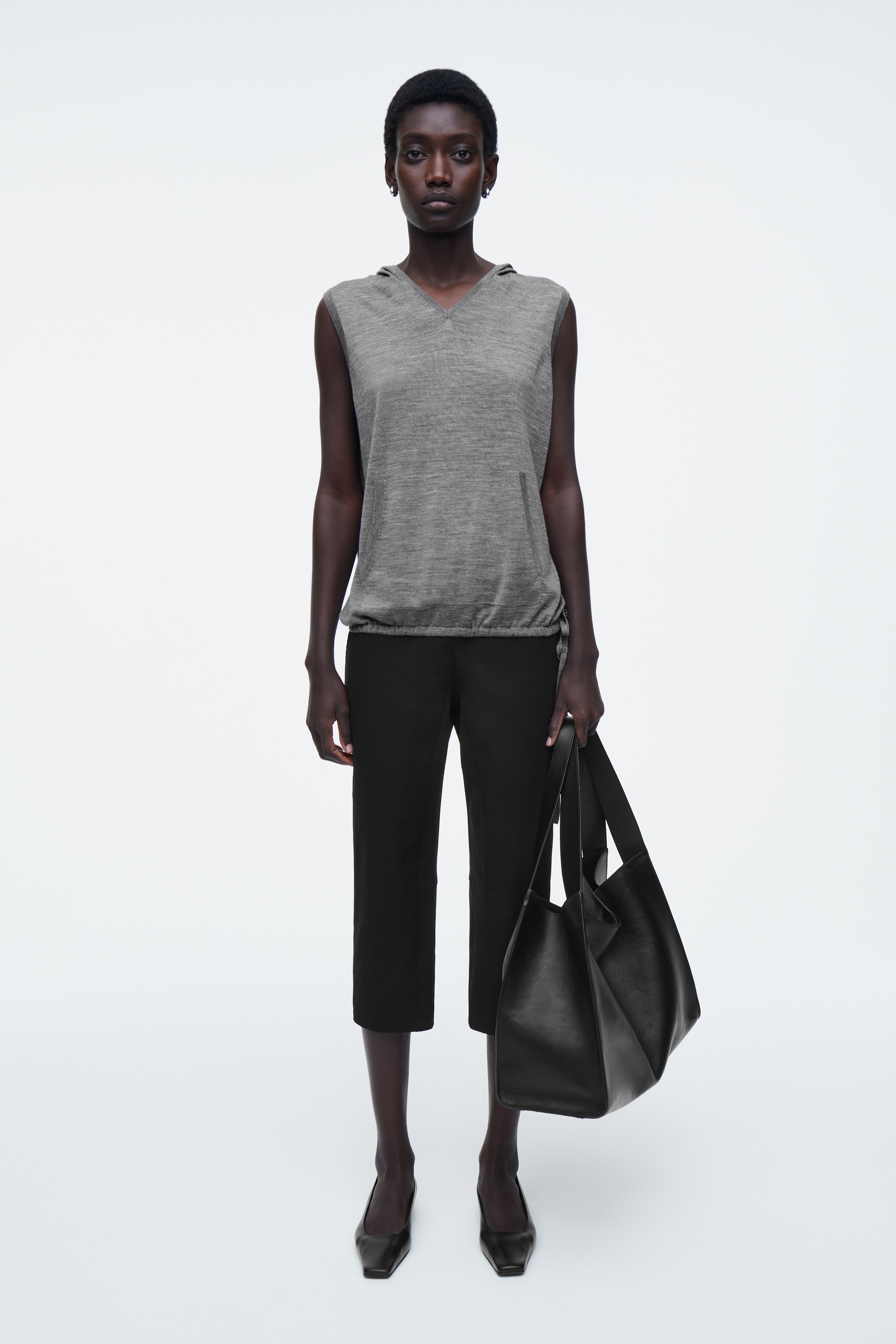 Visualizza immagine più grande: FELPA CON CAPPUCCIO SENZA MANICHE IN LANA MERINO - GRIGIO MÉLANGE - DONNA | H&M IT 2