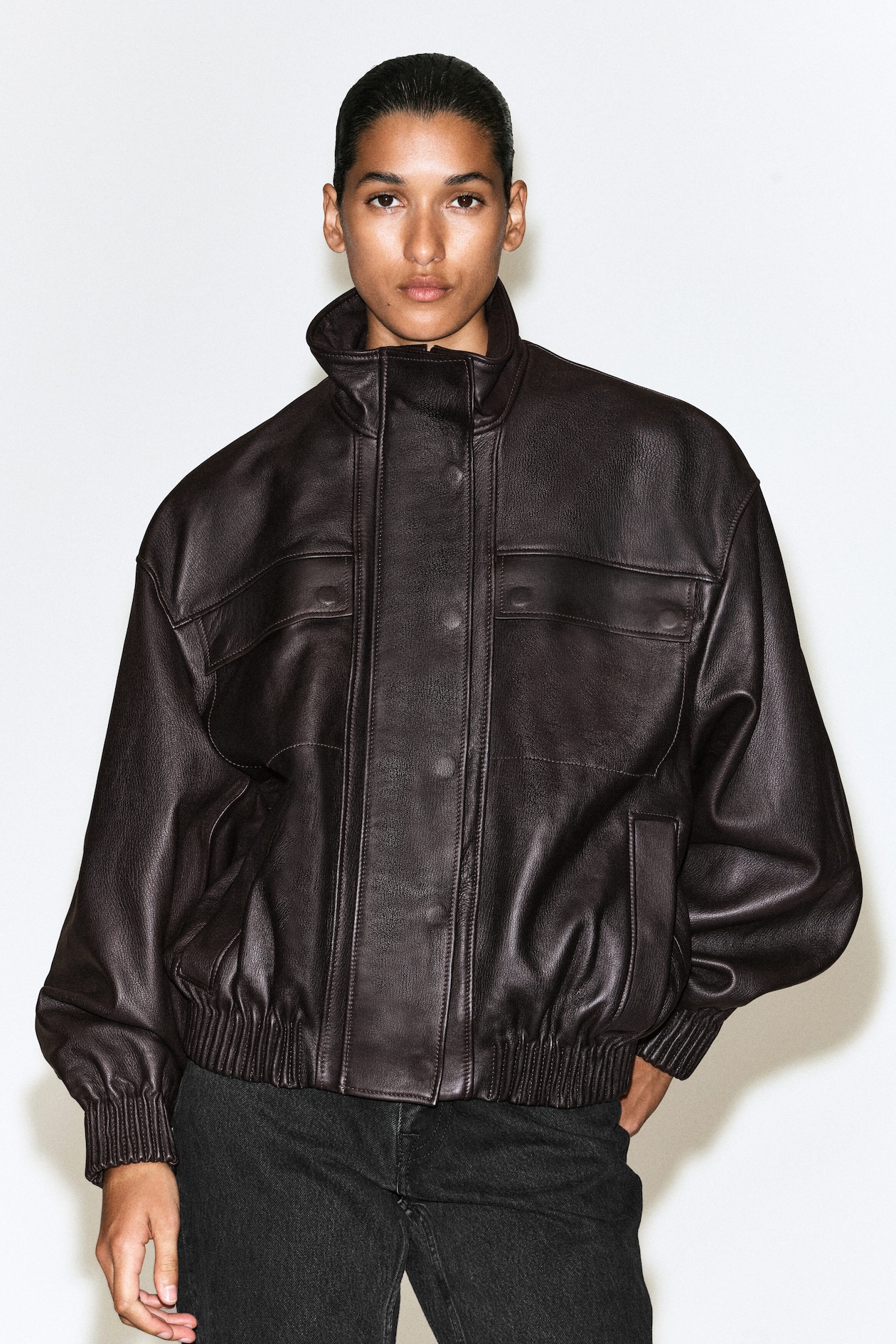 LEATHER MOCK-NECK BOMBER JACKET — DARK BROWN
