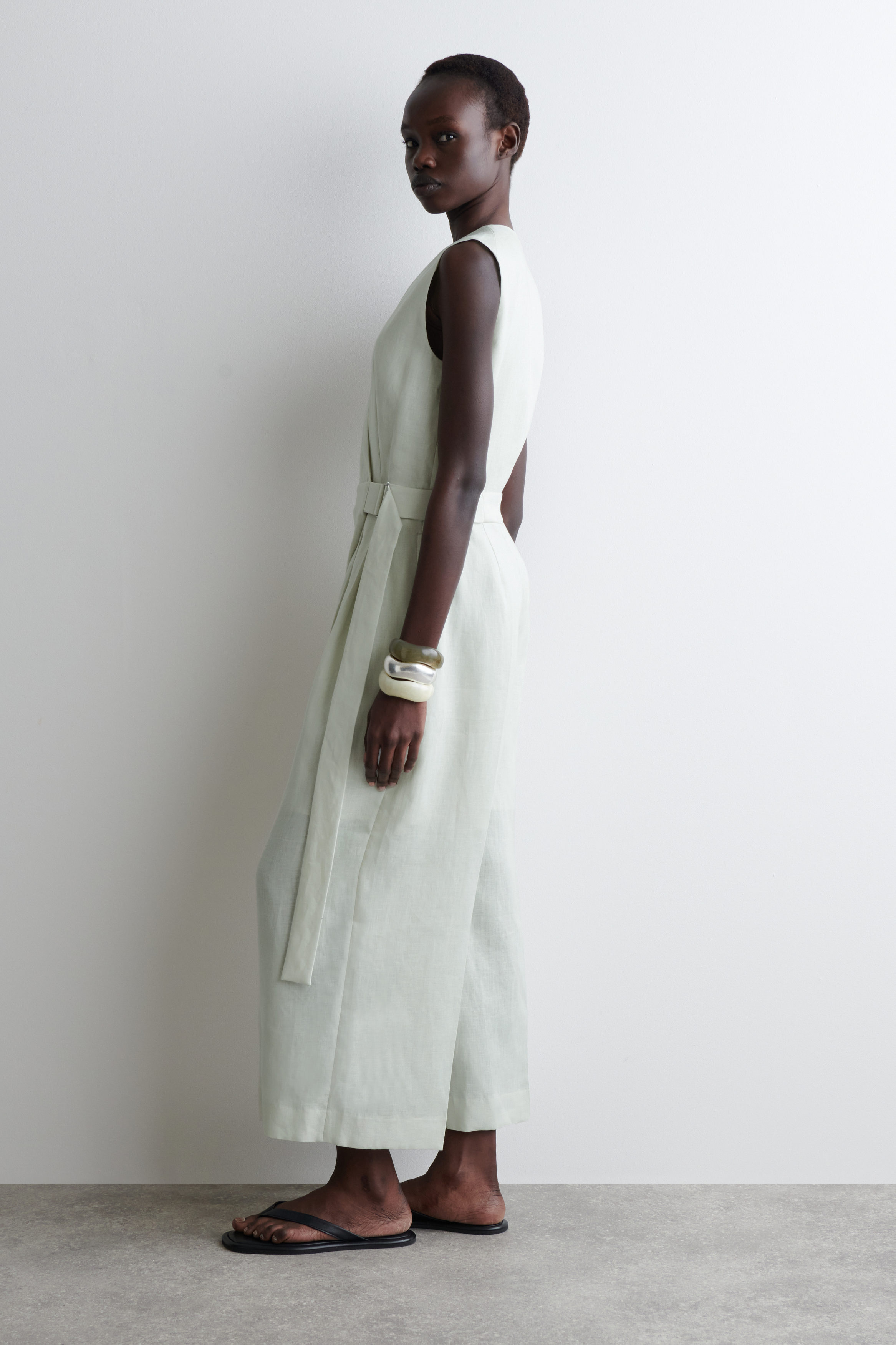 WRAP-FRONT LINEN JUMPSUIT - LIGHT GREEN | COS