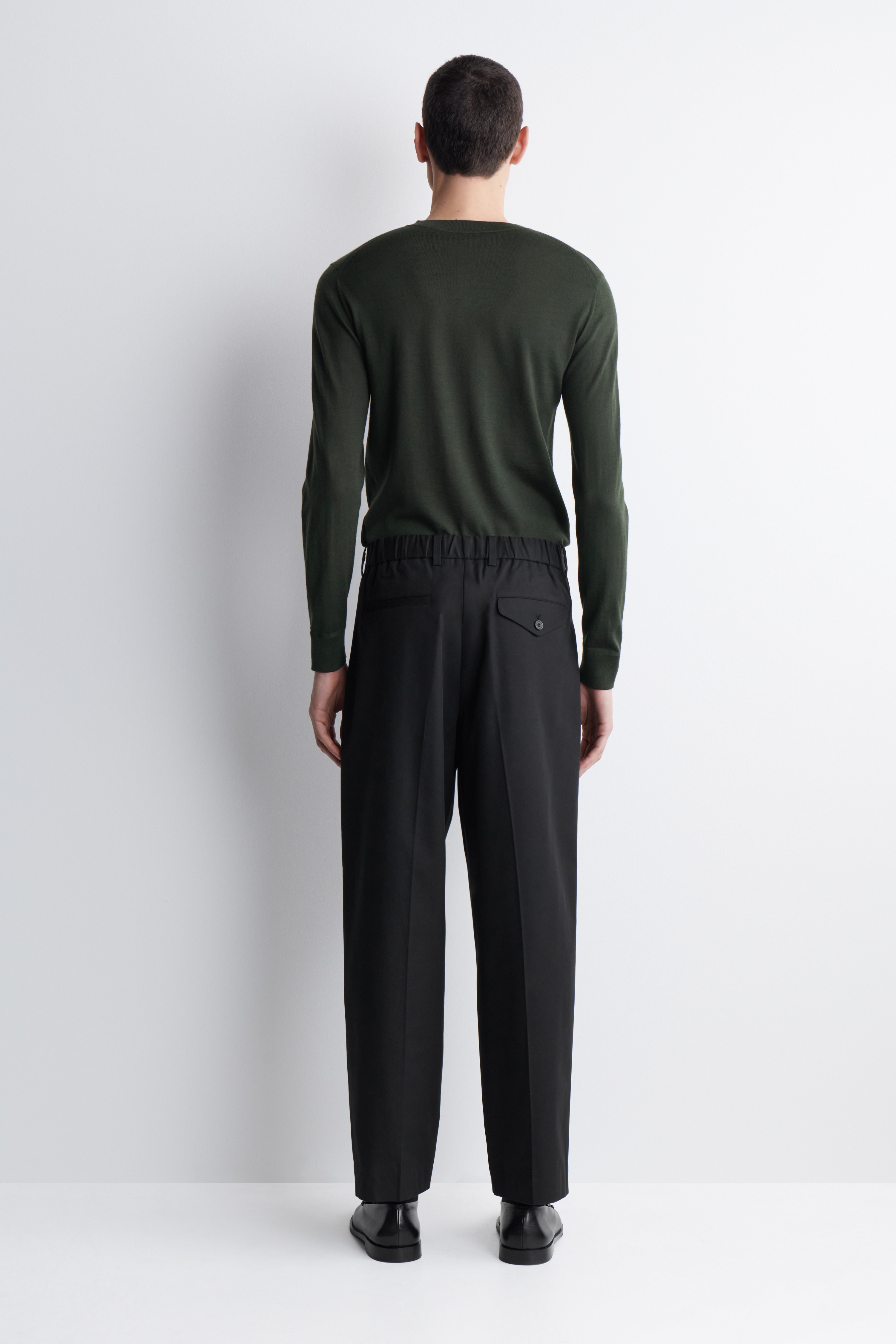 PLEATED RELAXED-FIT TAPERED TROUSERS