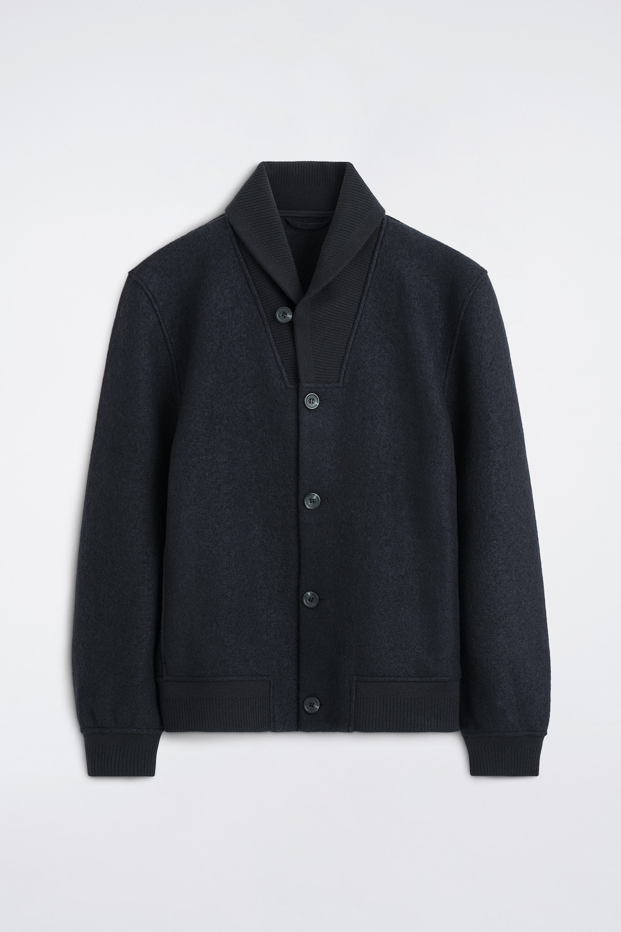 The boiled-wool shawl-collar jacket is shown in a front view, featuring a textured dark navy blue finish with a five-button closure. It showcases a ribbed knit shawl collar, ribbed cuffs, and a matching ribbed hem.