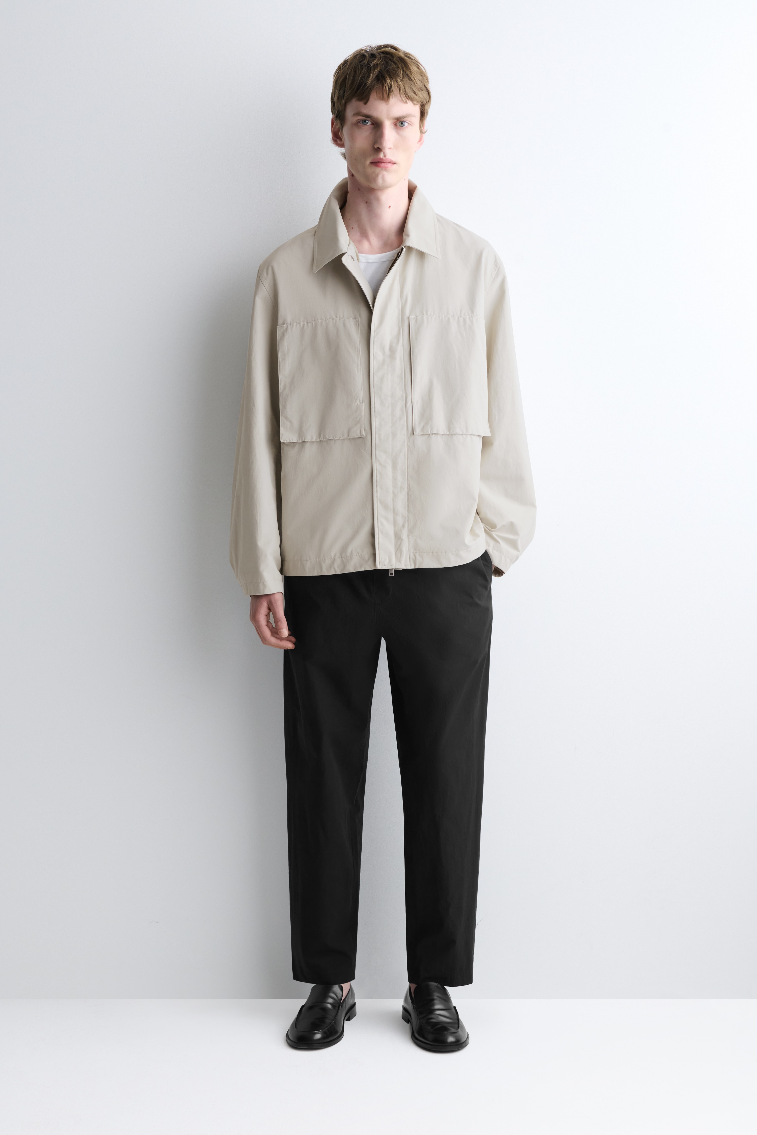 SCHMAL ZULAUFENDE BAUMWOLLHOSE - SCHWARZ/BEIGE