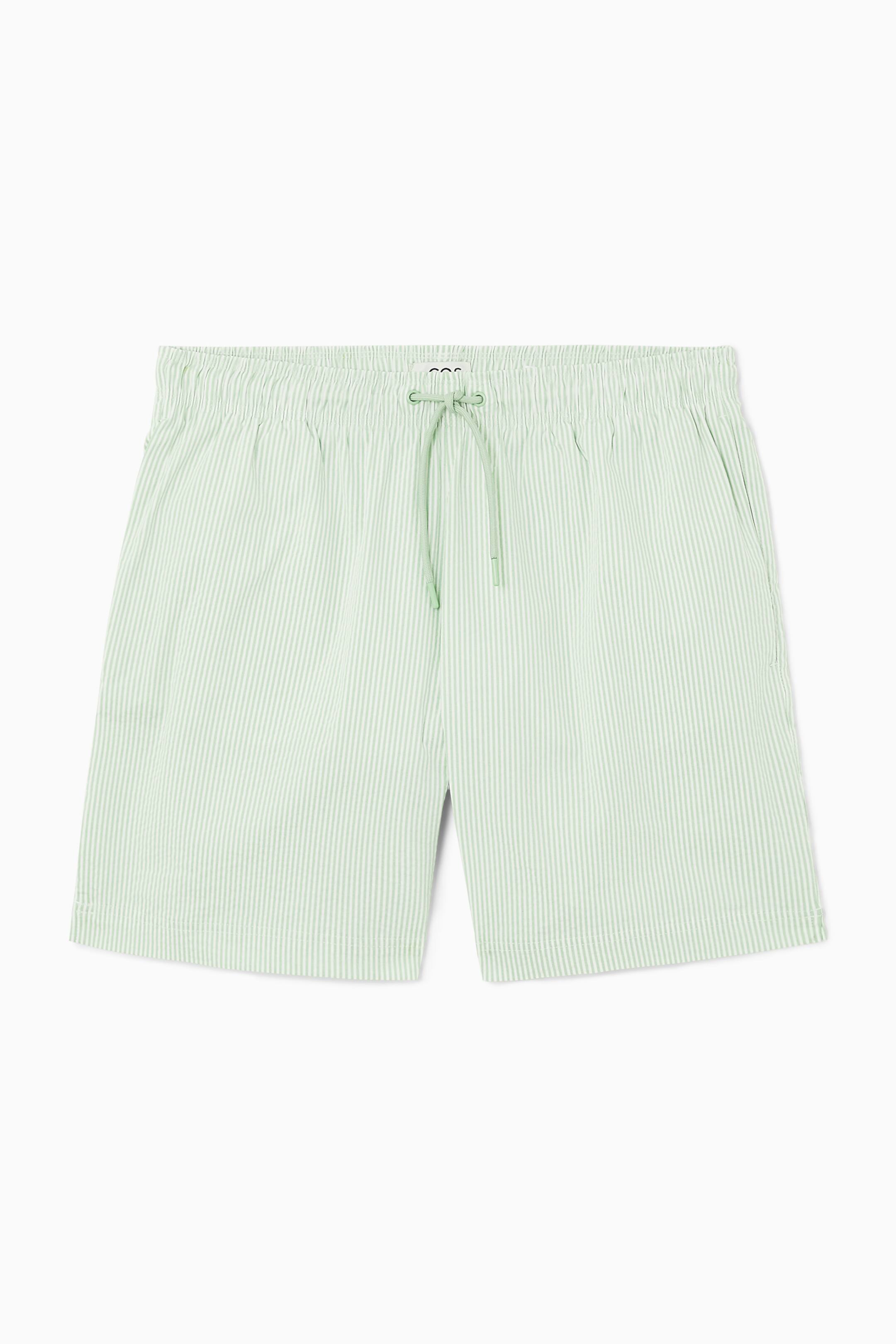 Näytä suurempi kuva: Raidalliset seersucker-uimashortsit - GREEN / STRIPED - MIEHET | H&M FI 1