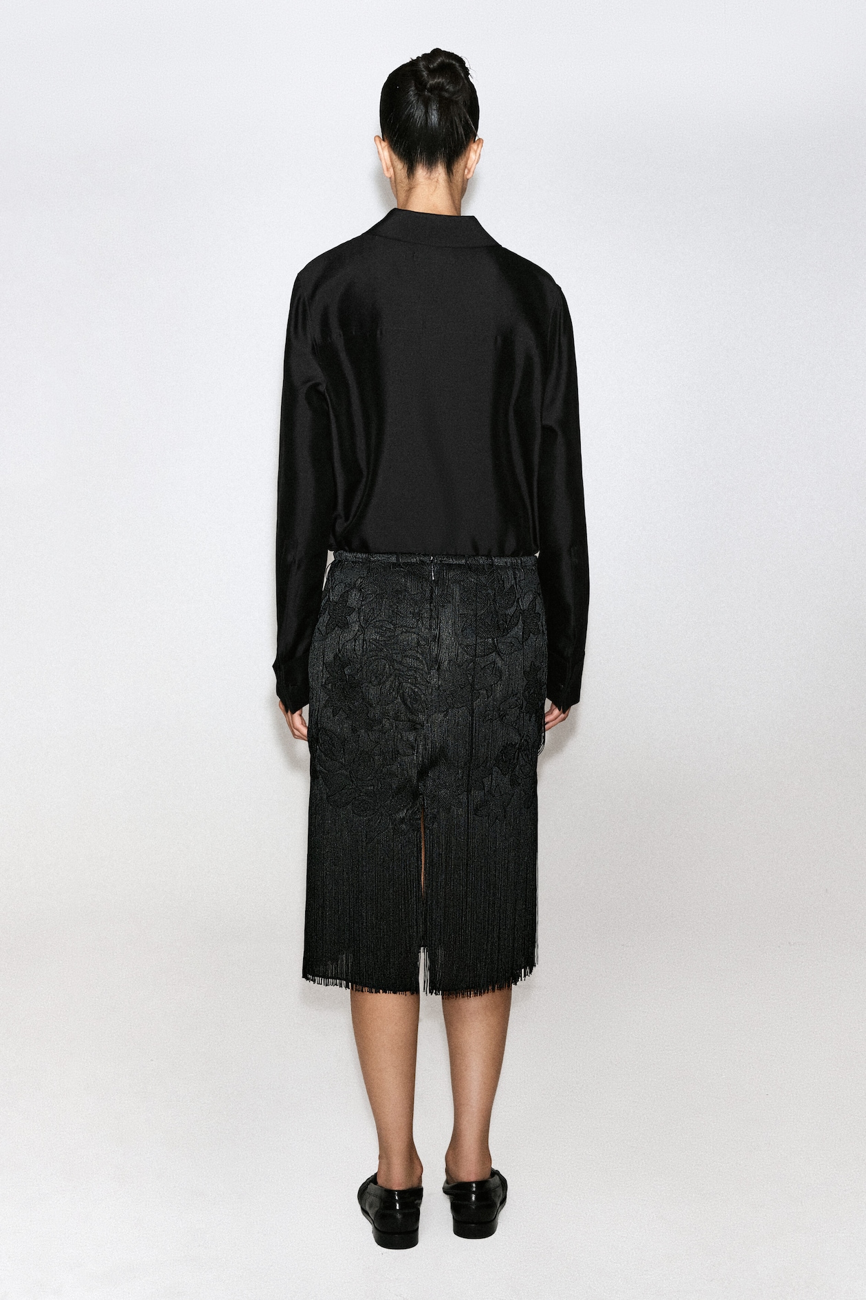 EMBROIDERED FRINGED MIDI SKIRT — CARBON