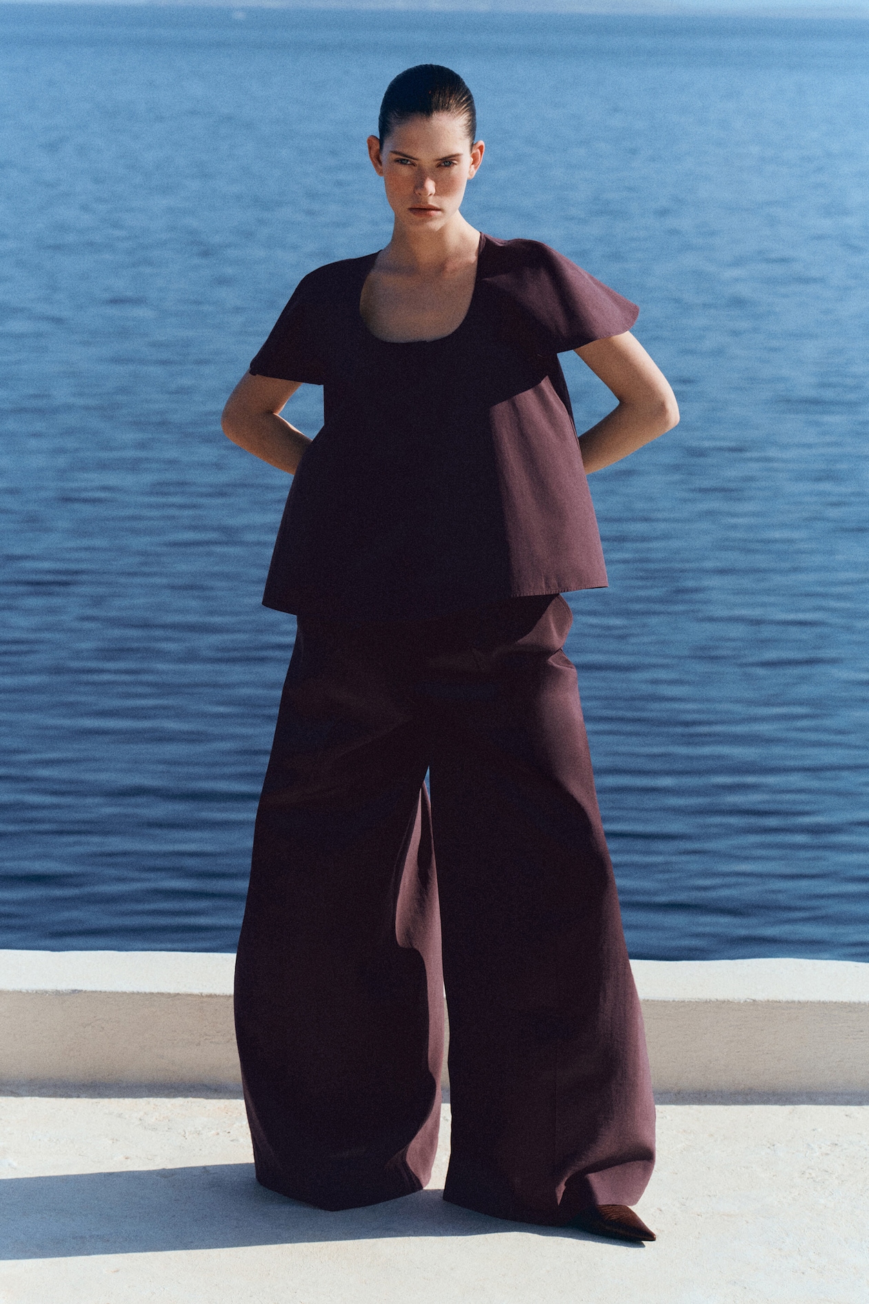 PLEATED MODAL WIDE-LEG TROUSERS — DARK RED