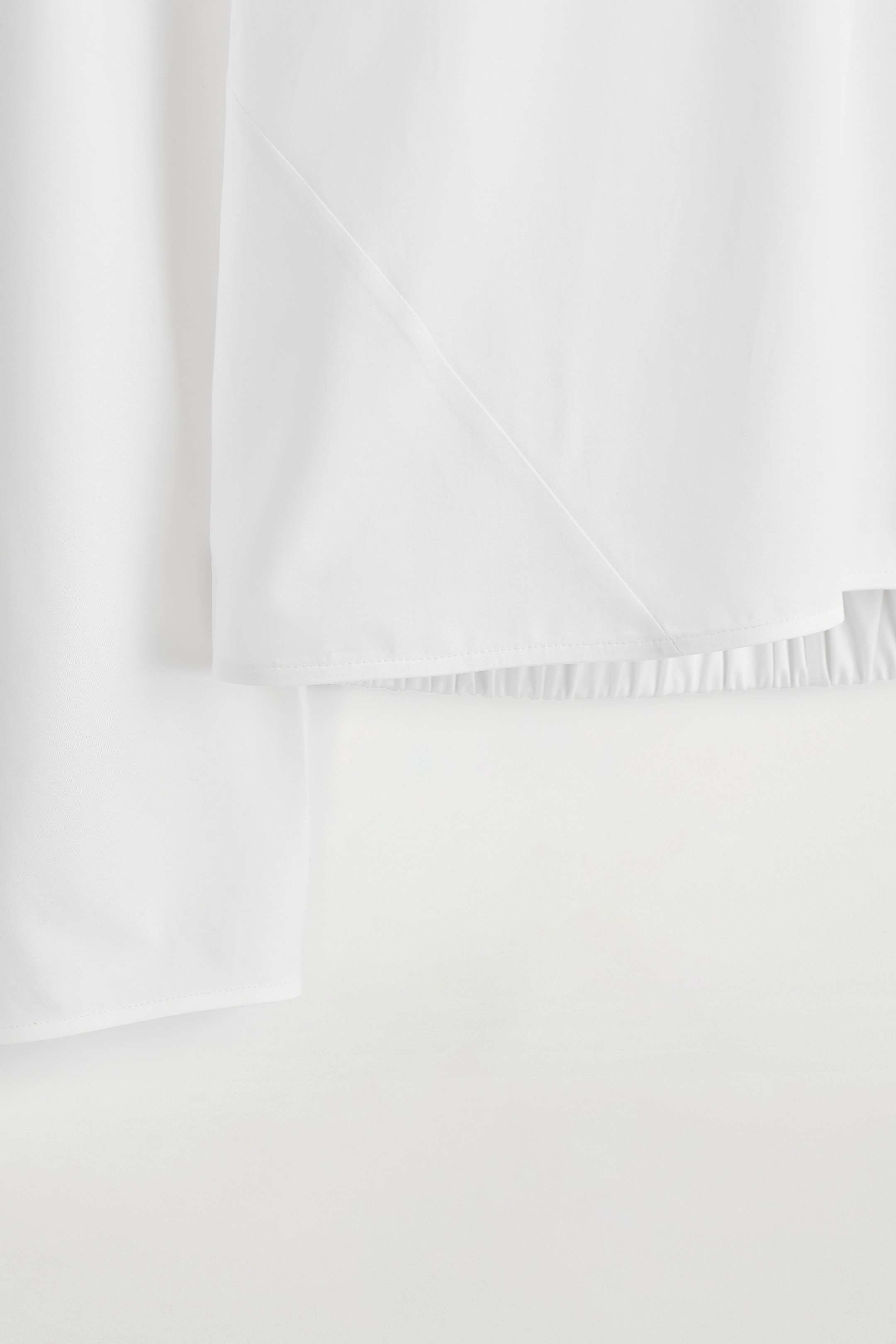 BOMULLSBLUS MED STÅKRAGE