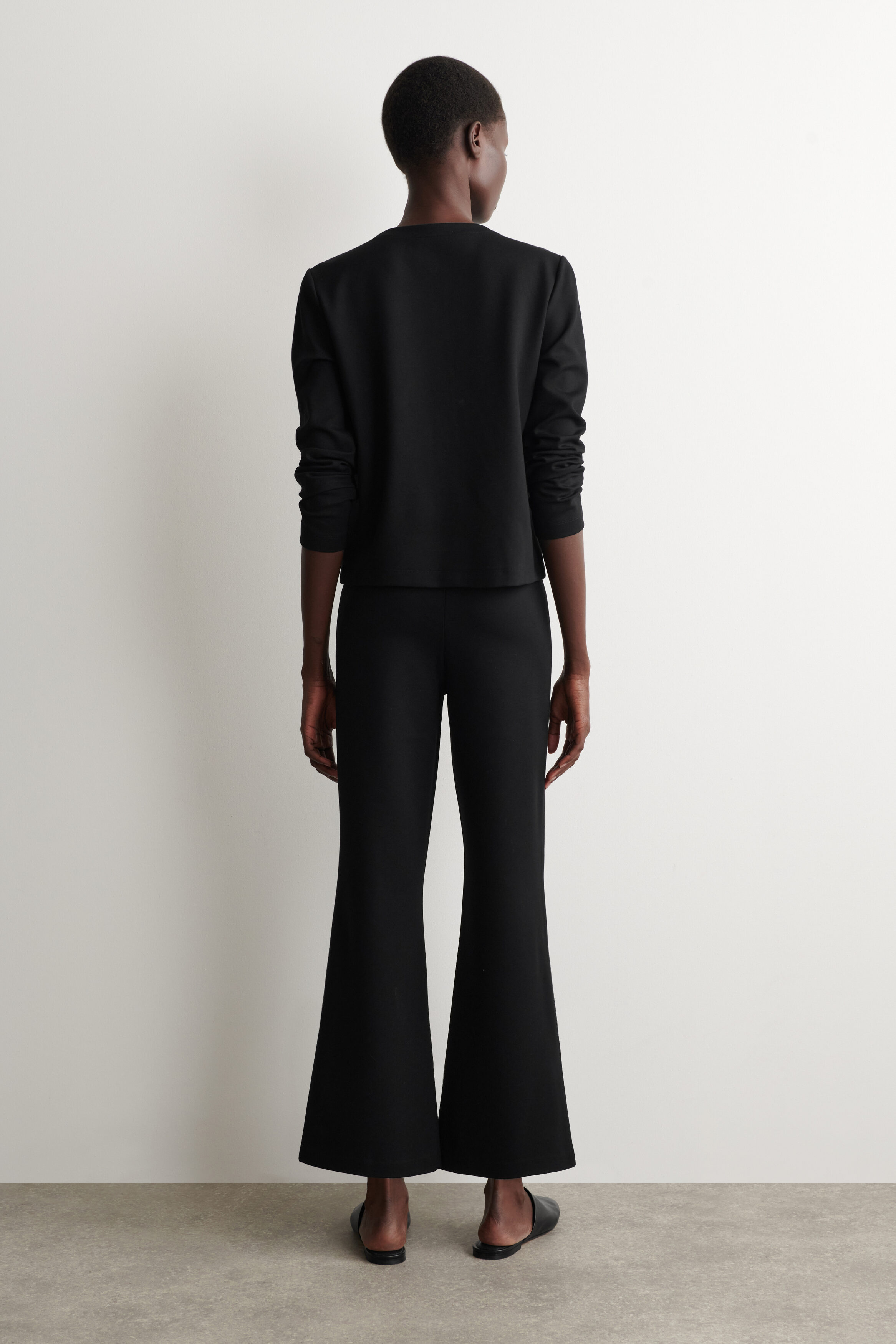 JERSEY FLARED PANTS - BLACK | COS US