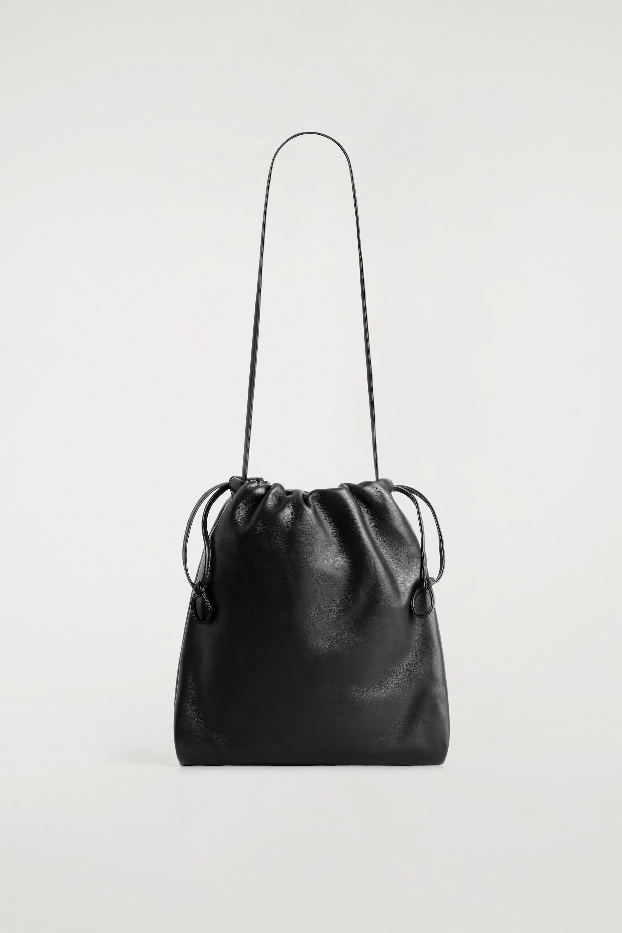 DRAWSTRING CROSSBODY BAG - LEATHER