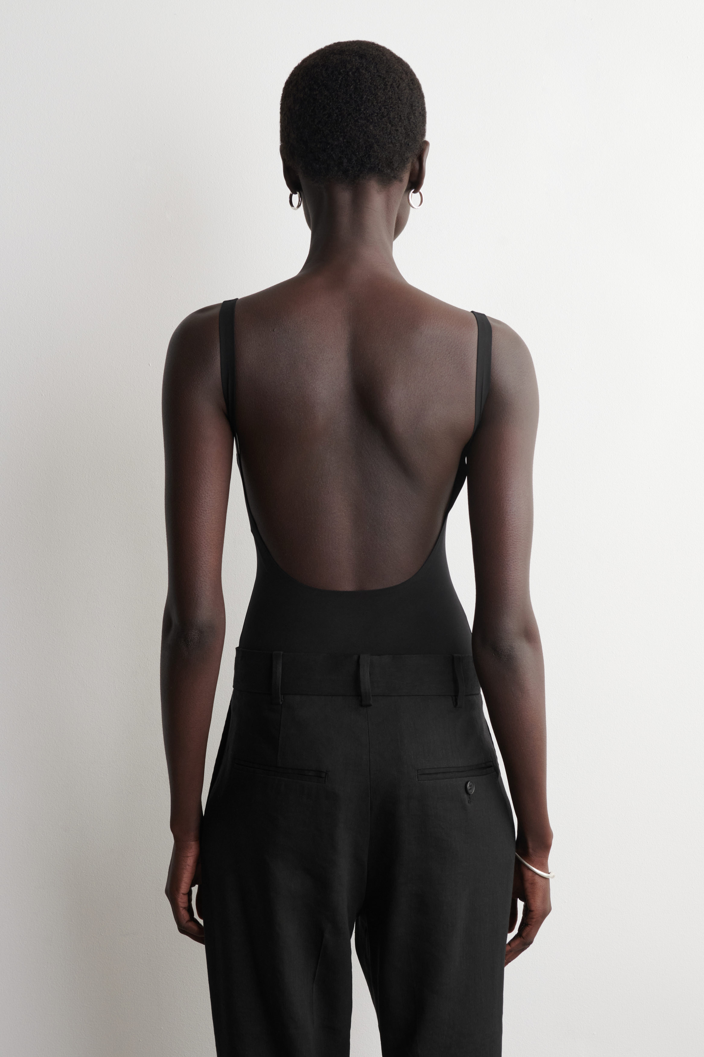 INTERLOCK JERSEY BODYSUIT - BLACK | COS CA
