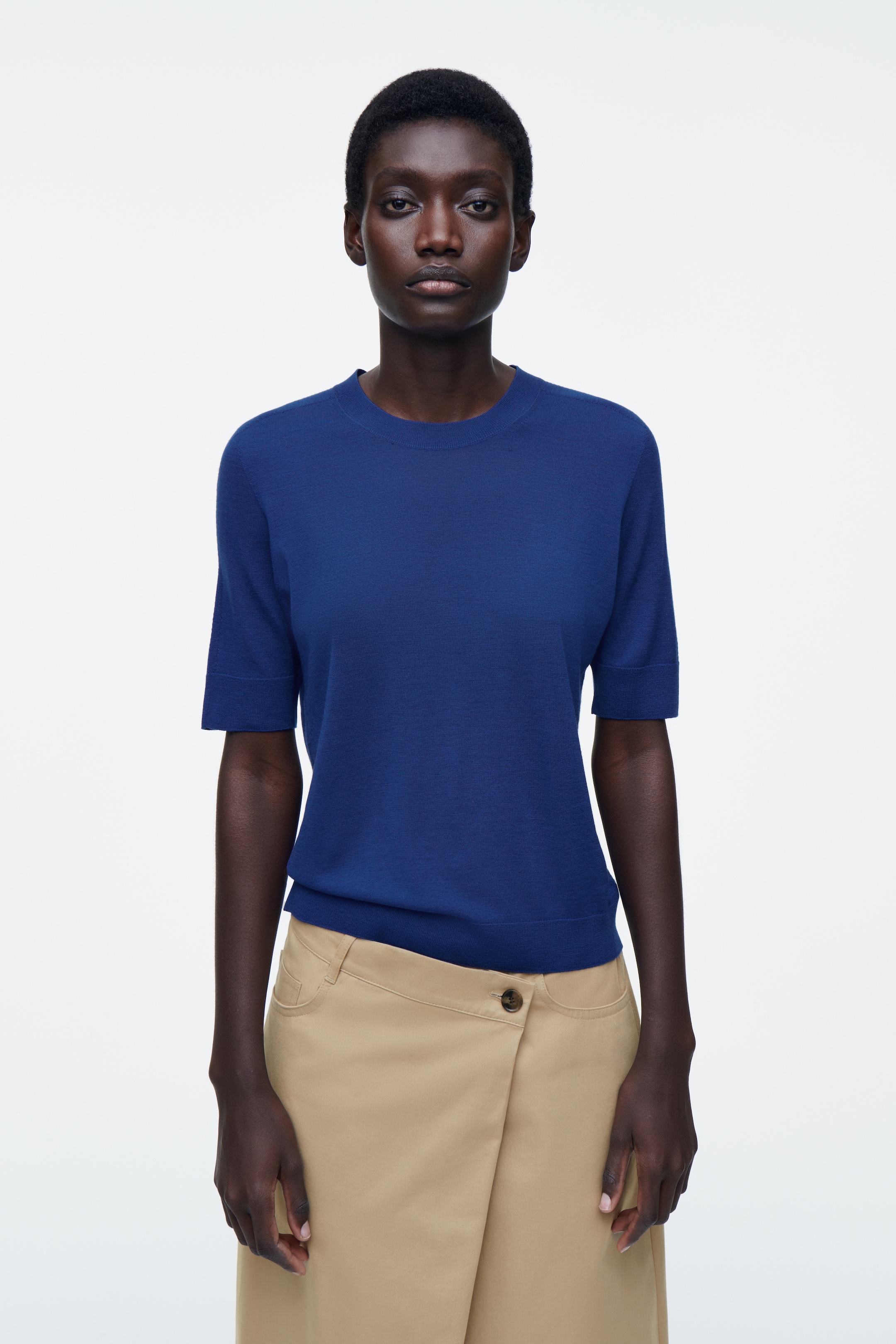 Visualizza immagine più grande: T-SHIRT SLIM IN LANA MERINO SENZA CUCITURE - BLU - DONNA | H&M IT 1