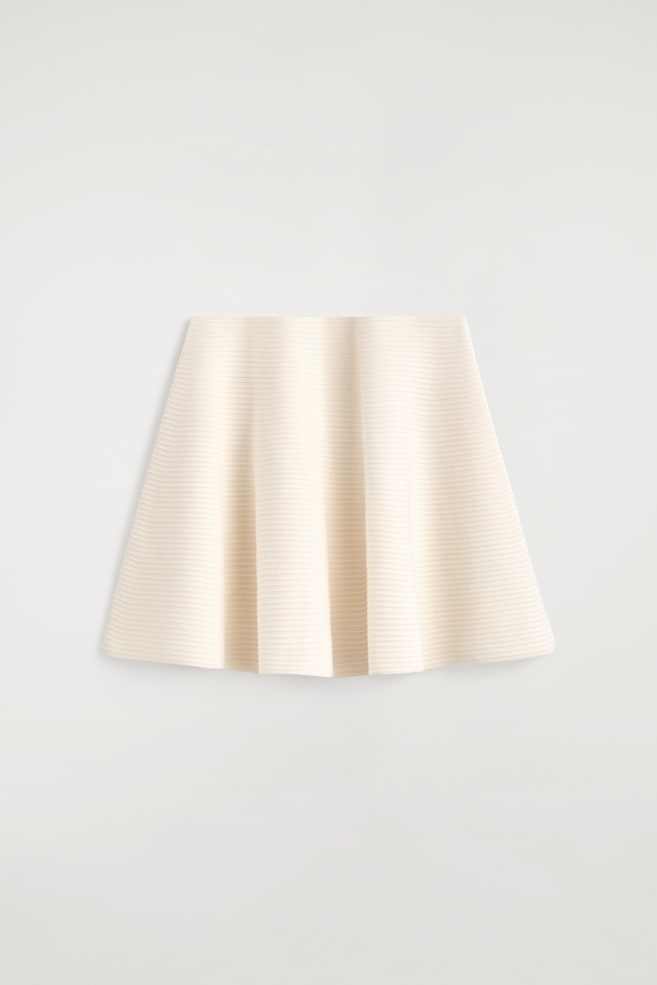 PLETENÁ ÁČKOVÁ MINI SUKŇA - SLONOVINOVÁ - 1