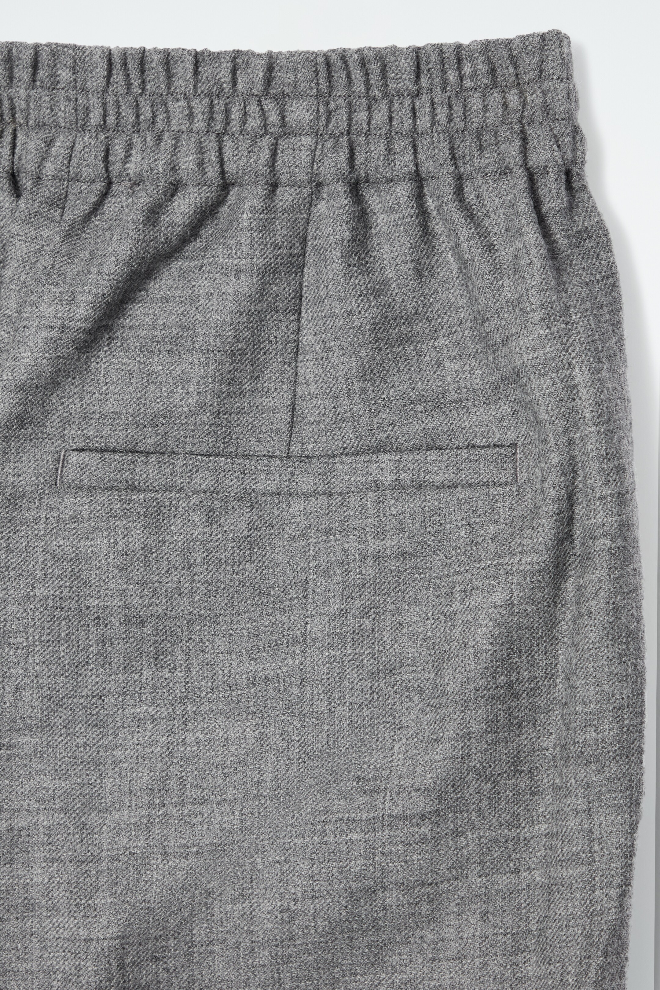 Ingrandisci l'immagine: ELASTICATED WOOL-FLANNEL TROUSERS - GREY MÉLANGE - DONNA | H&M CH 2