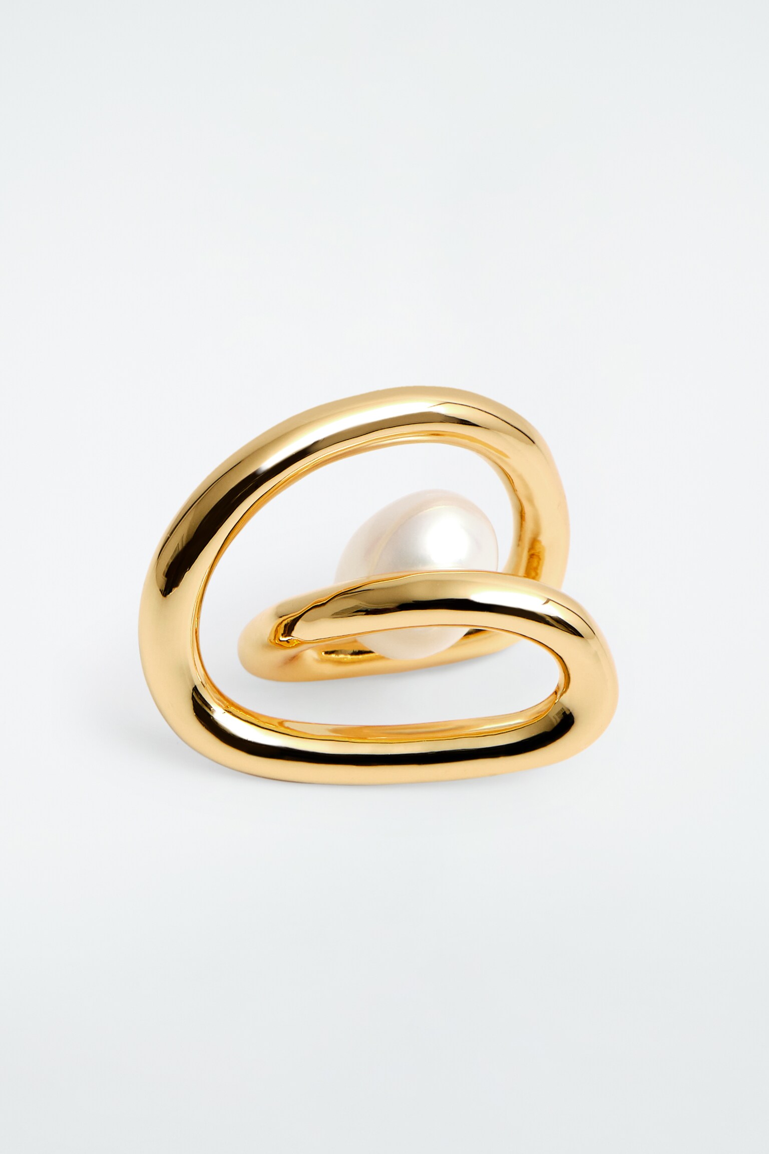 PENDIENTES DESIGUALES ESPIRAL Y PERLA - DORADO - 5
