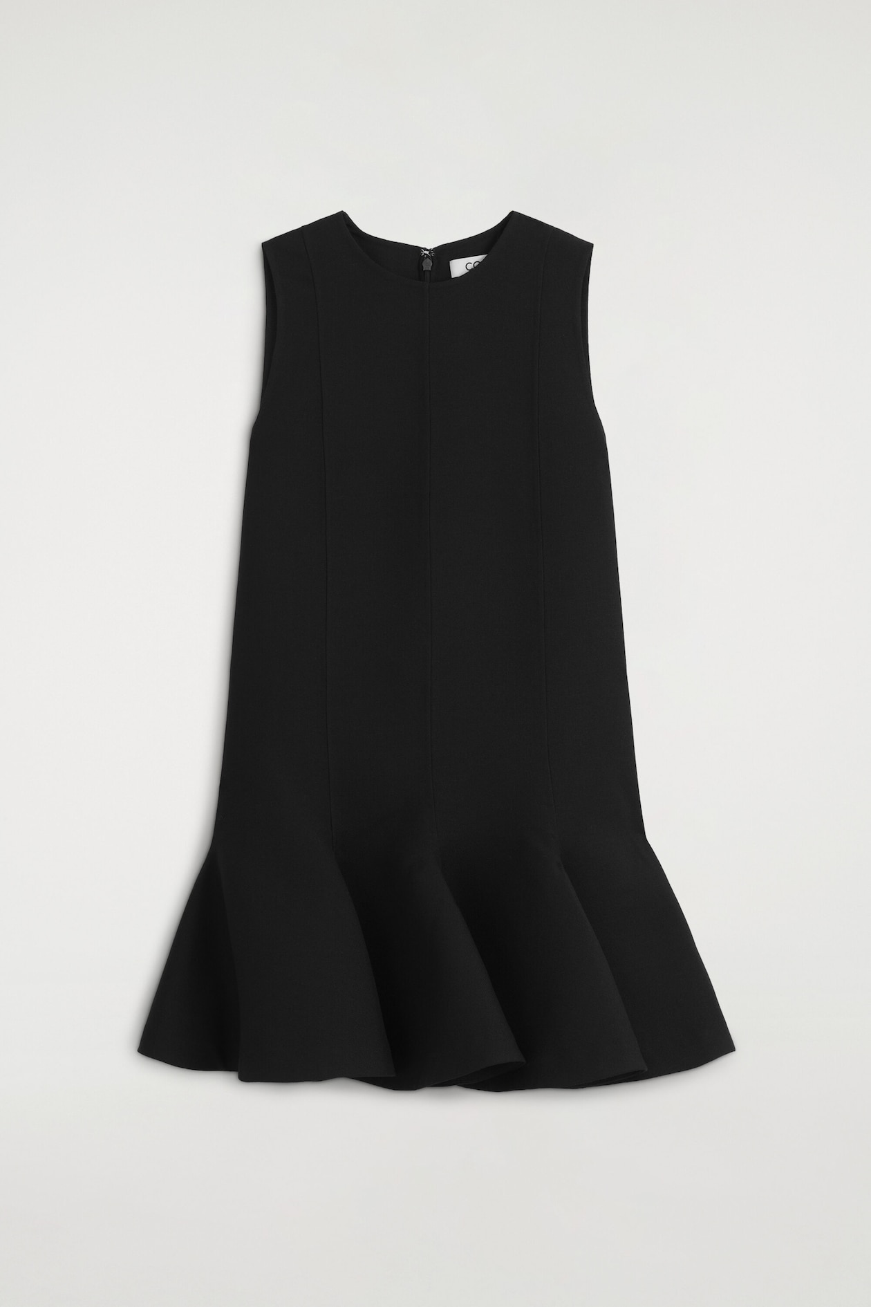A black sleeveless dress is shown from the front, featuring a round neckline and vertical panel seams along the bodice. The design transitions into a structured, flounced hemline that flares out at the hem.