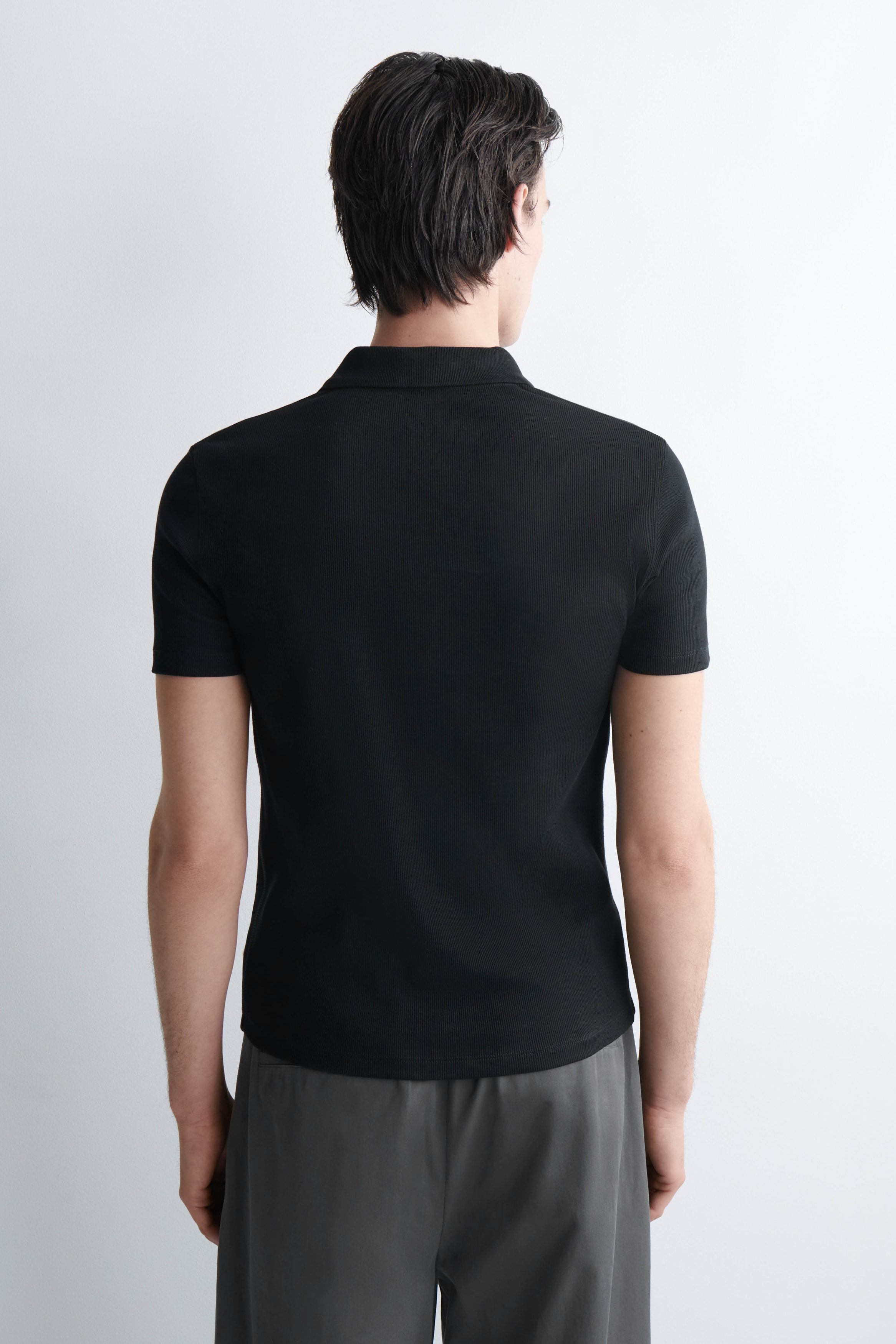 SLIM RIBBED COTTON POLO SHIRT - BLACK | COS US