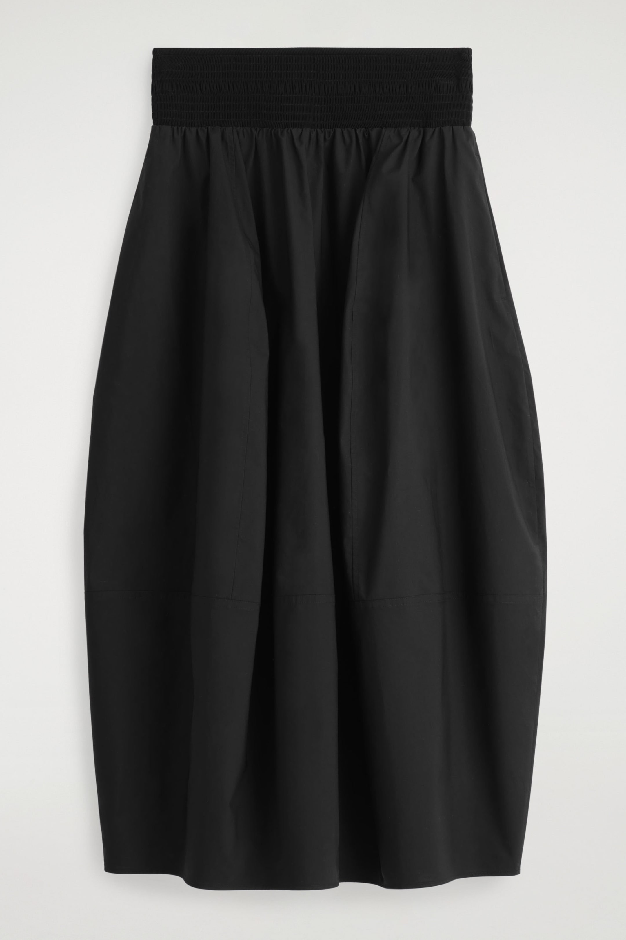 SMOCKED PANELED MIDI SKIRT