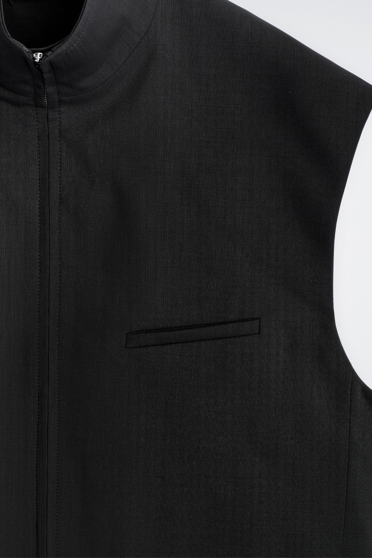 TAILORED FUNNEL-NECK WOOL GILET — CARBON