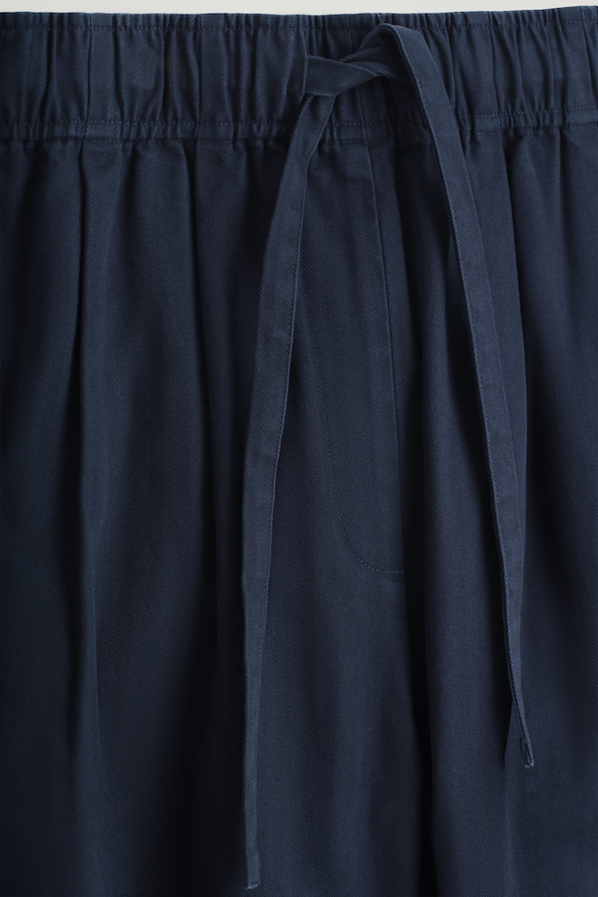 COTTON TAPERED DRAWSTRING TROUSERS — NAVY