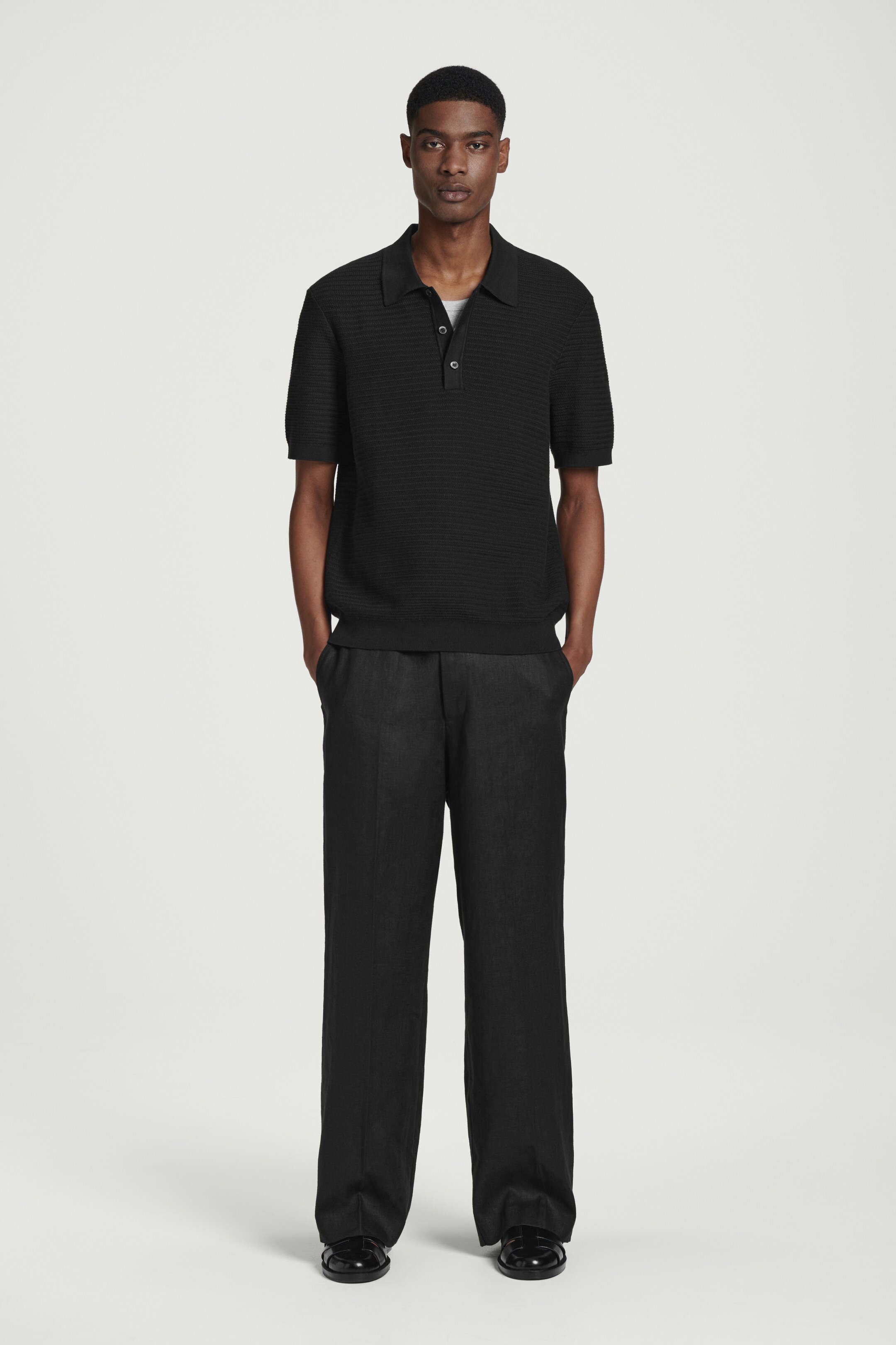 Visualizza immagine più grande: POLO IN MAGLIA DI COTONE TESTURIZZATA - NERO - UOMO | H&M IT 3