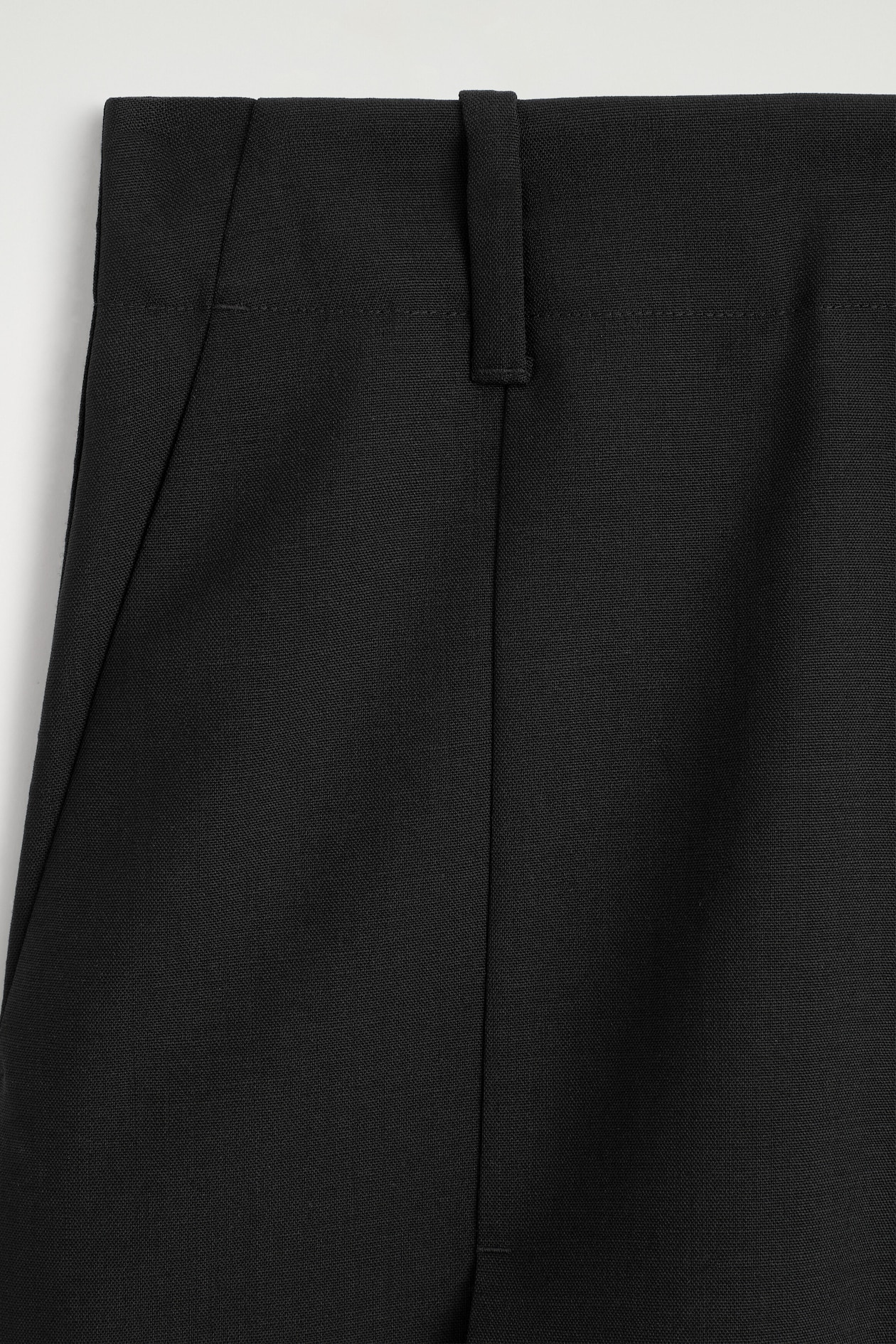 BOX-PLEAT WOOL MIDI SKIRT — BLACK