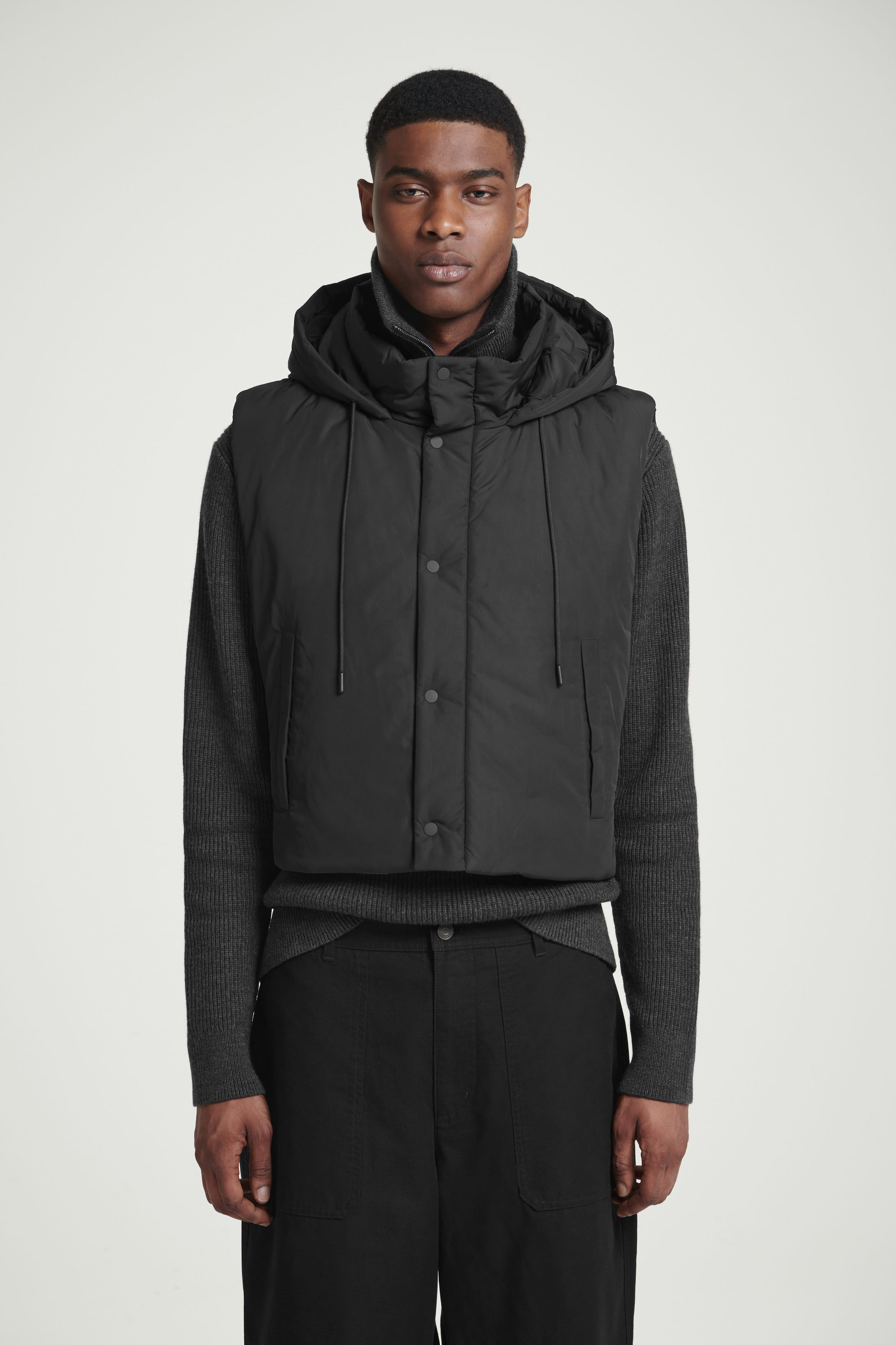 BUCKLED-SIDE PADDED HOODED VEST - BLACK | COS