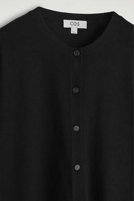 CIRCLE-CUT MERINO WOOL CARDIGAN — BLACK 1