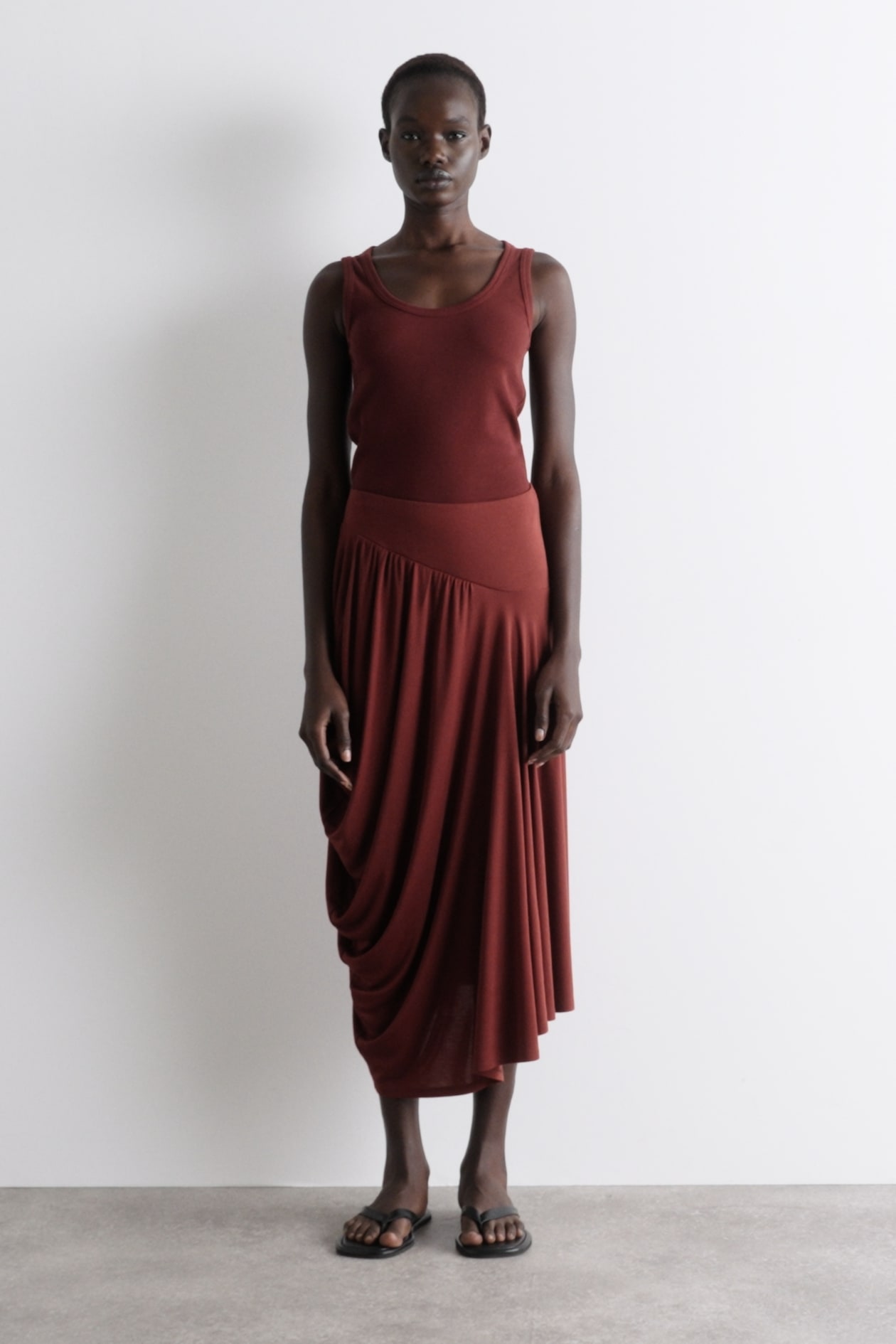 ASYMMETRIC DRAPED MIDI SKIRT