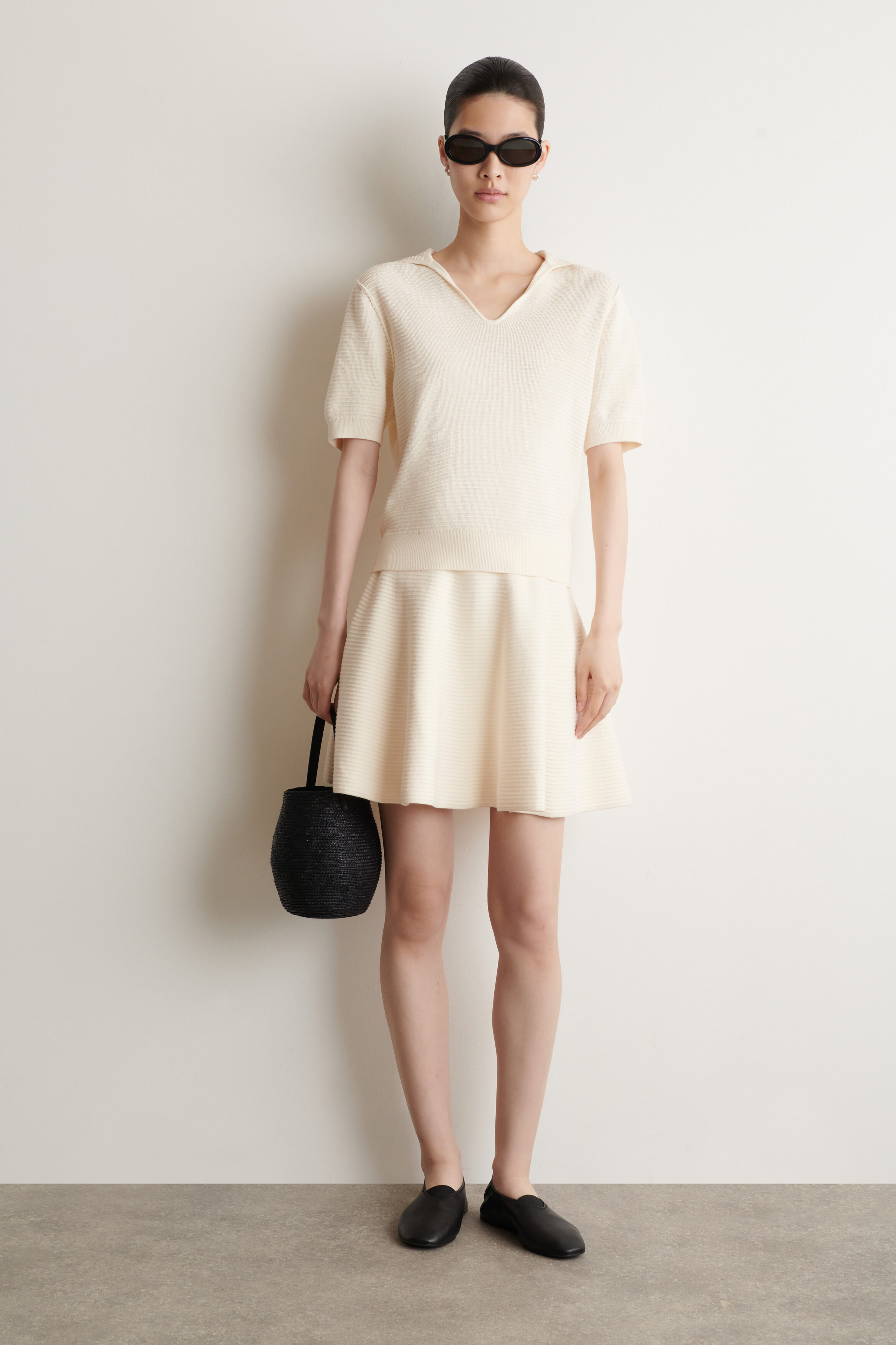 KNITTED FLARED MINI SKIRT - IVORY | COS CA
