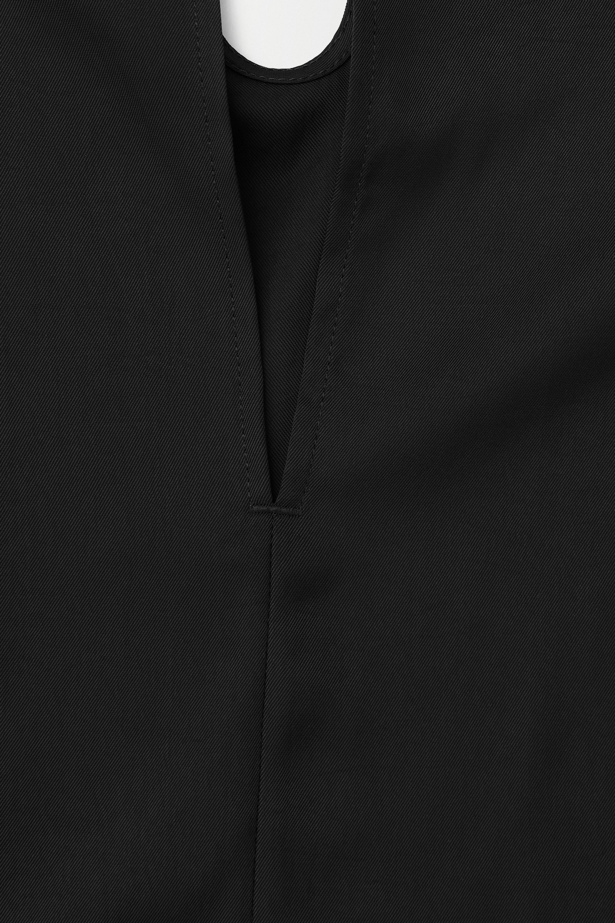 THE FLUID JUMPSUIT